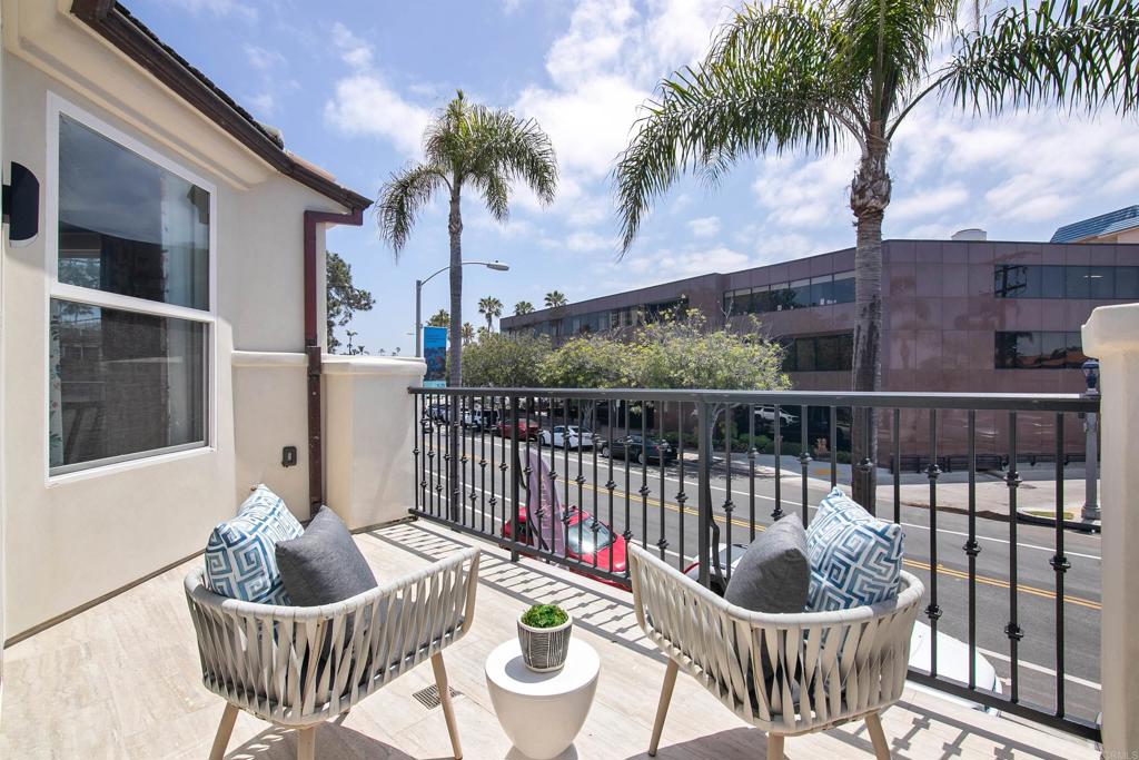 848 Prospect Street, Unit E La Jolla, CA 92037 - Photo 8 of 16 a balcony with furniture and a potted plant