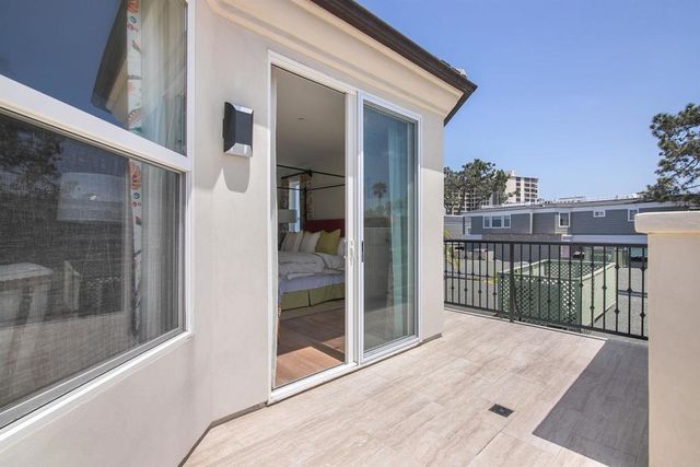 a balcony with a door