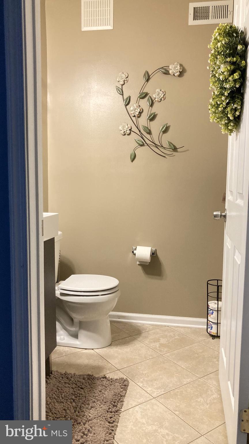 34 Springfield Circle Middletown, DE 19709 - Photo 12 of 34 a bathroom with a toilet and a shower