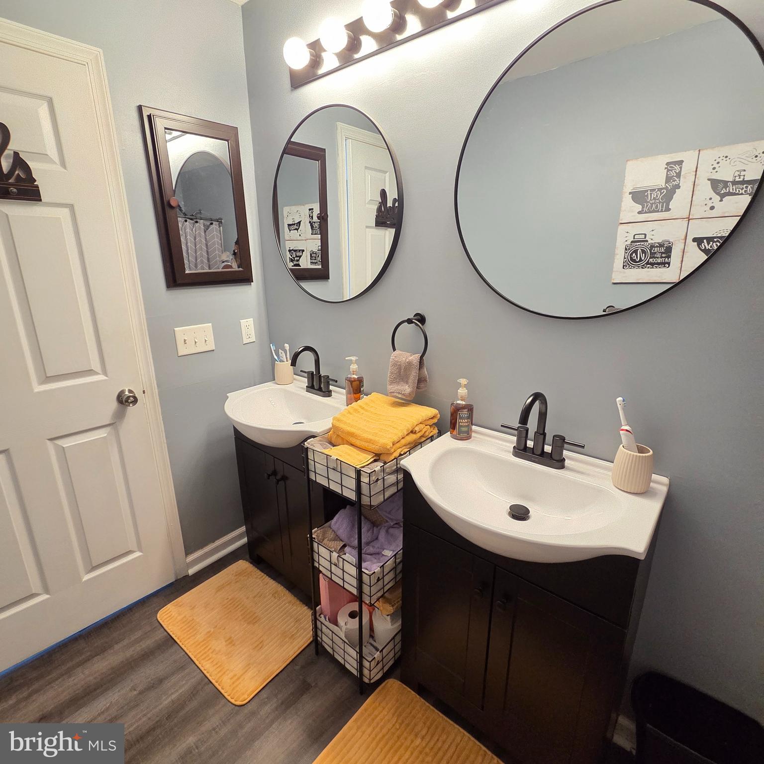 34 Springfield Circle Middletown, DE 19709 - Photo 15 of 34 a bathroom with a toilet a sink and a mirror