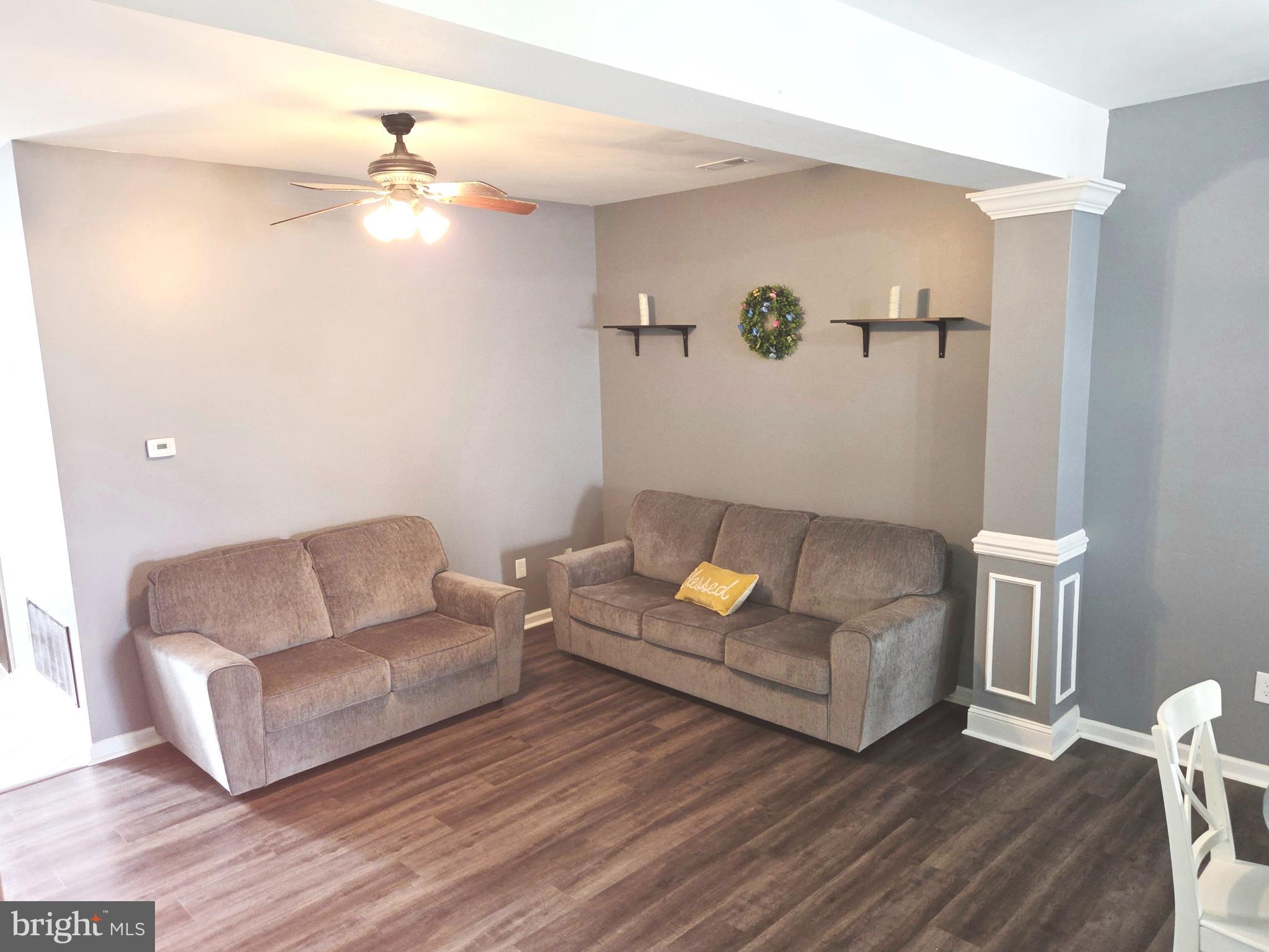 34 Springfield Circle Middletown, DE 19709 - Photo 6 of 34 a living room with furniture and a wooden floor