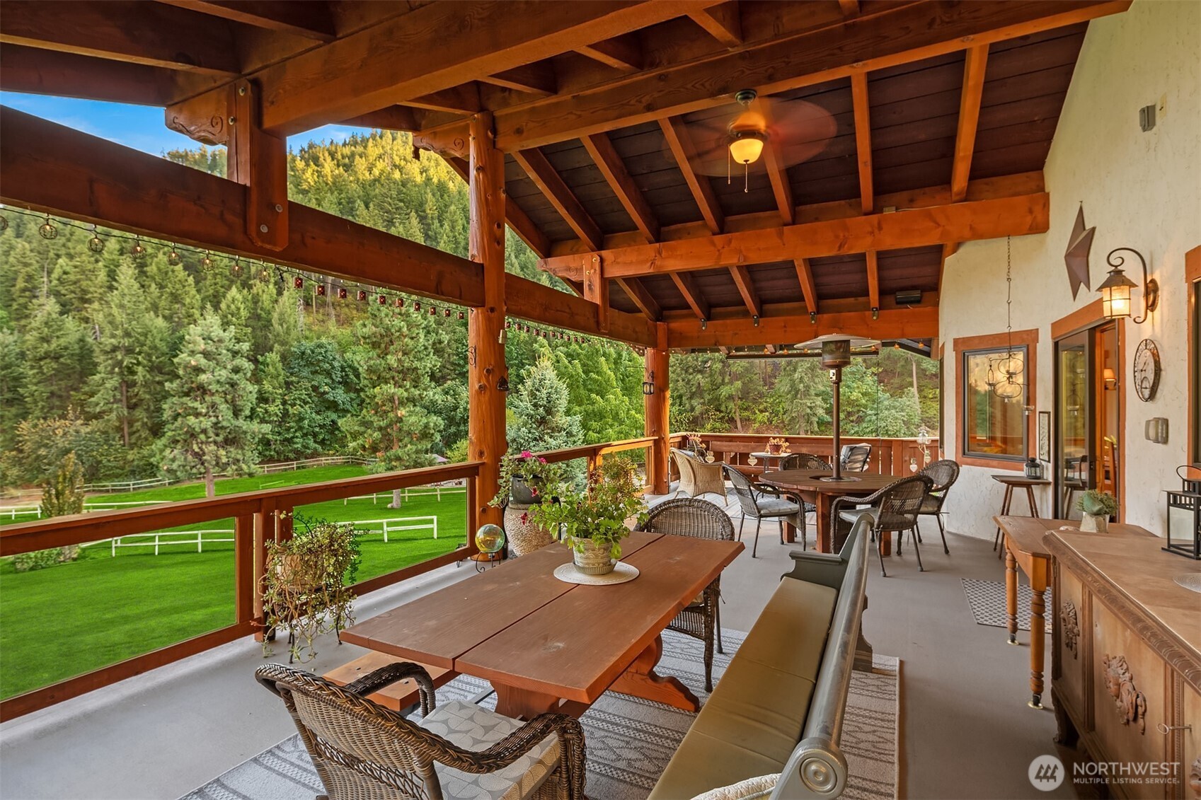 951 Willems Road Cashmere, WA 98815 - Photo 14 of 40 a view of a patio with table and chairs
