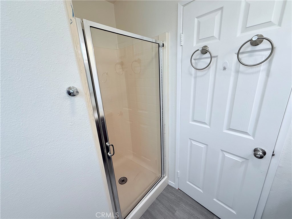 9287 Sierra Vista Circle Pico Rivera, CA 90660 - Photo 9 of 16 a bathroom with a shower and a mirror
