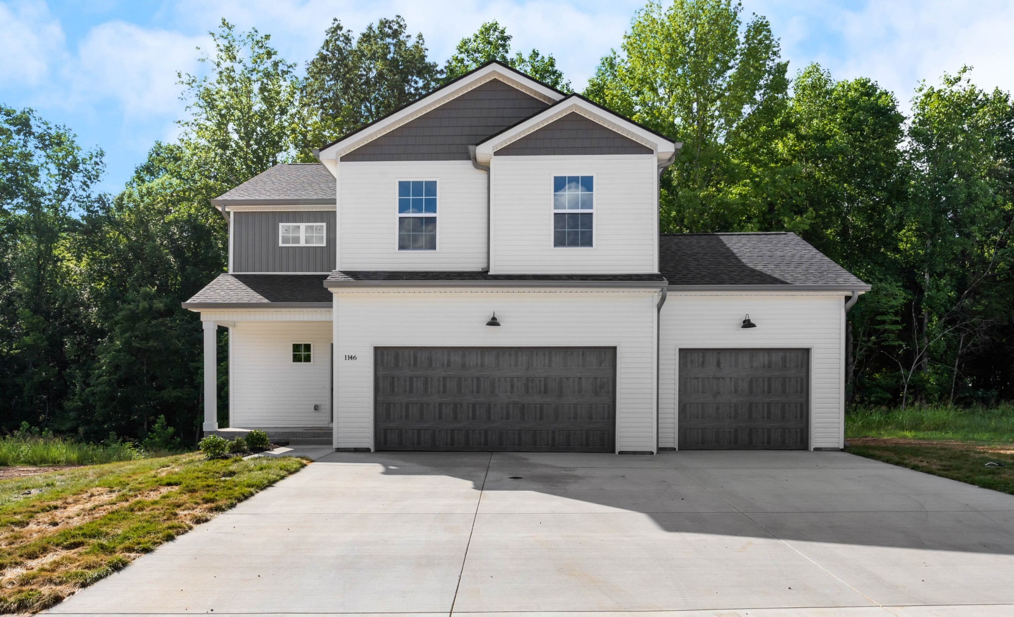 1146 Black Rock Road Clarksville, TN 37040 - Photo 2 of 36 a front view of a house with garage