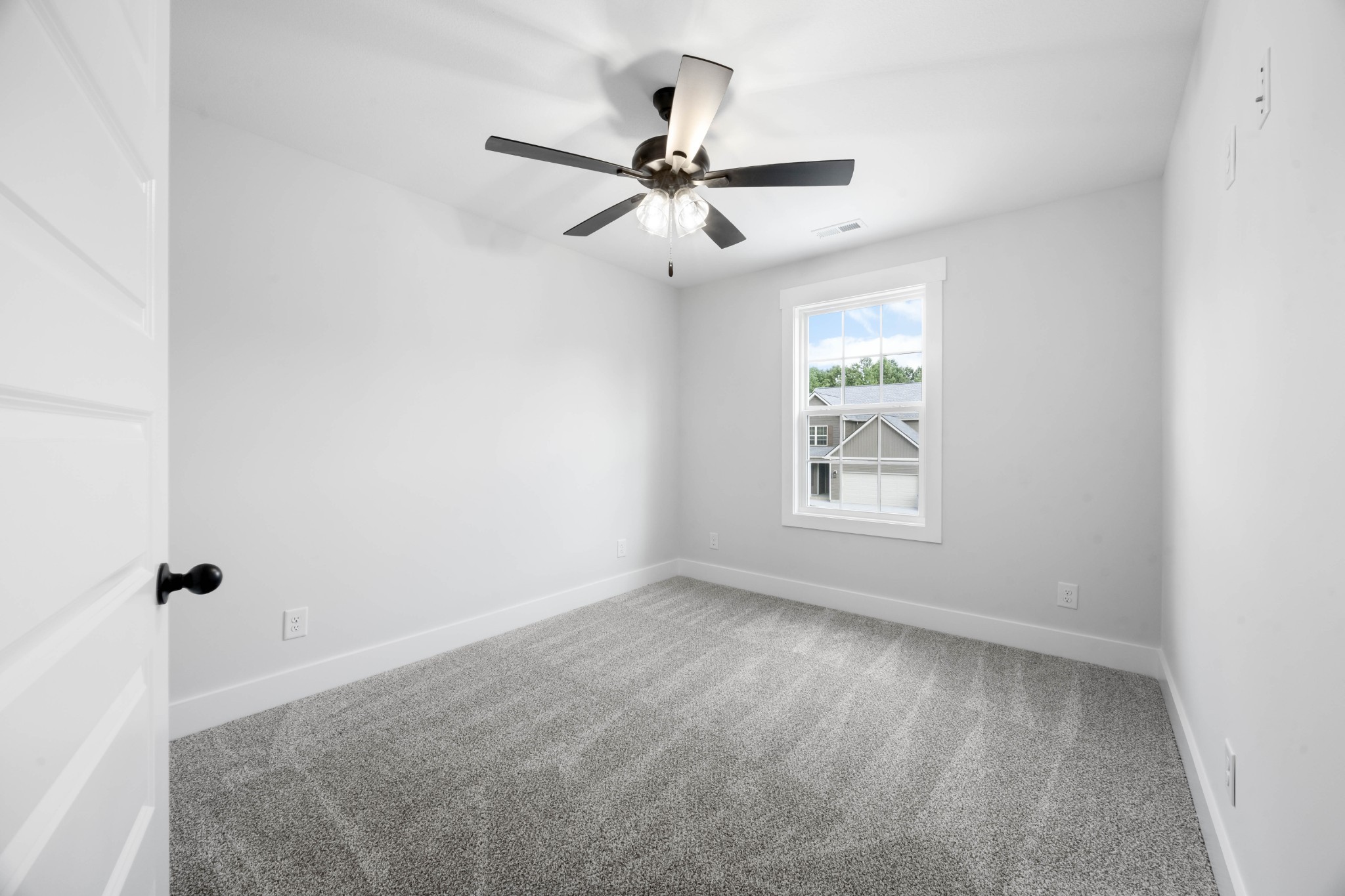1146 Black Rock Road Clarksville, TN 37040 - Photo 26 of 36 an empty room with windows and fan