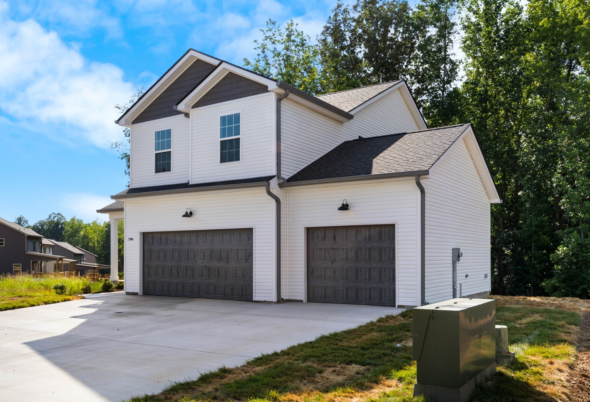 1146 Black Rock Road Clarksville, TN 37040 - Photo 3 of 36 a front view of a house with a yard and garage
