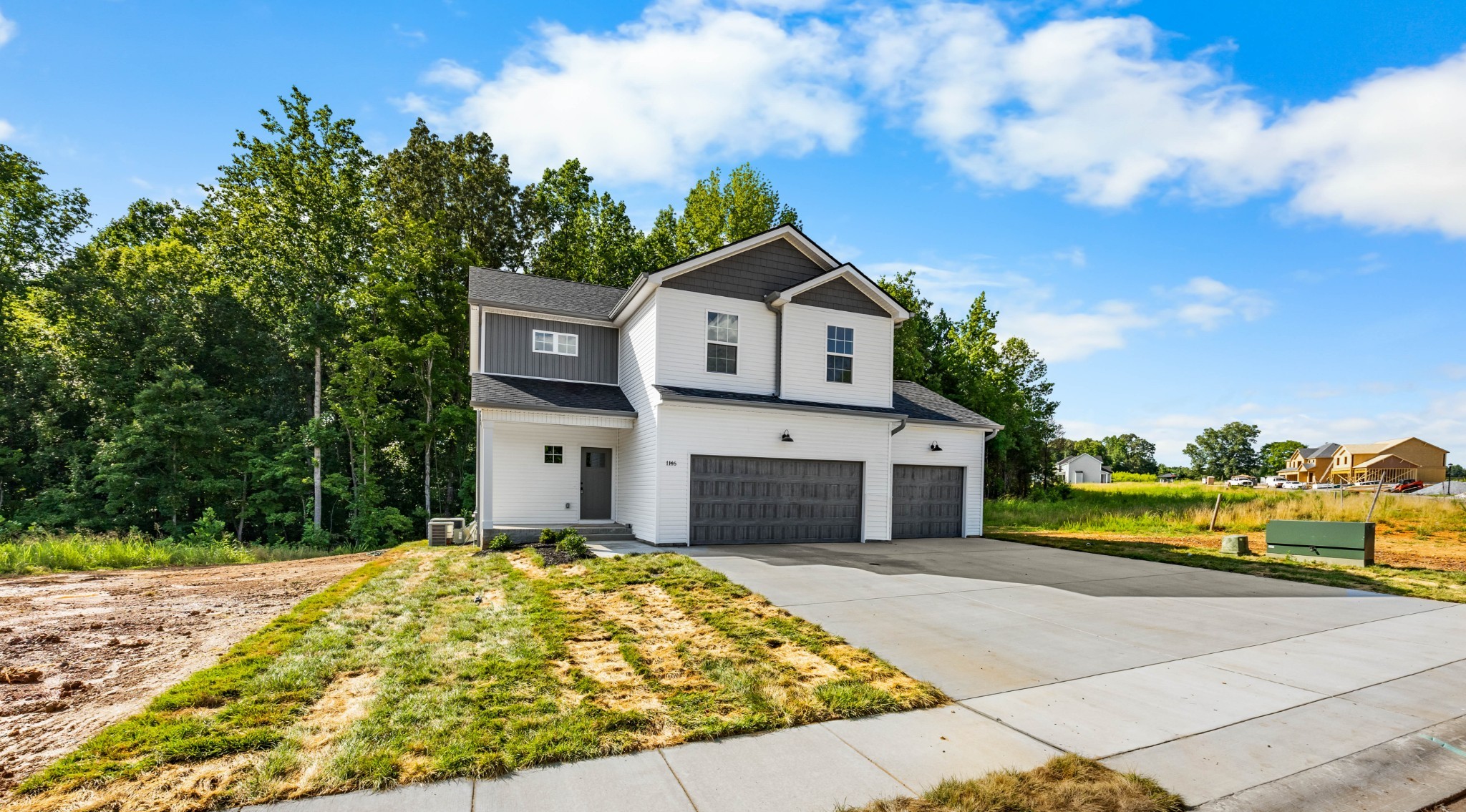 1146 Black Rock Road Clarksville, TN 37040 - Photo 6 of 36 a view of a house with a backyard