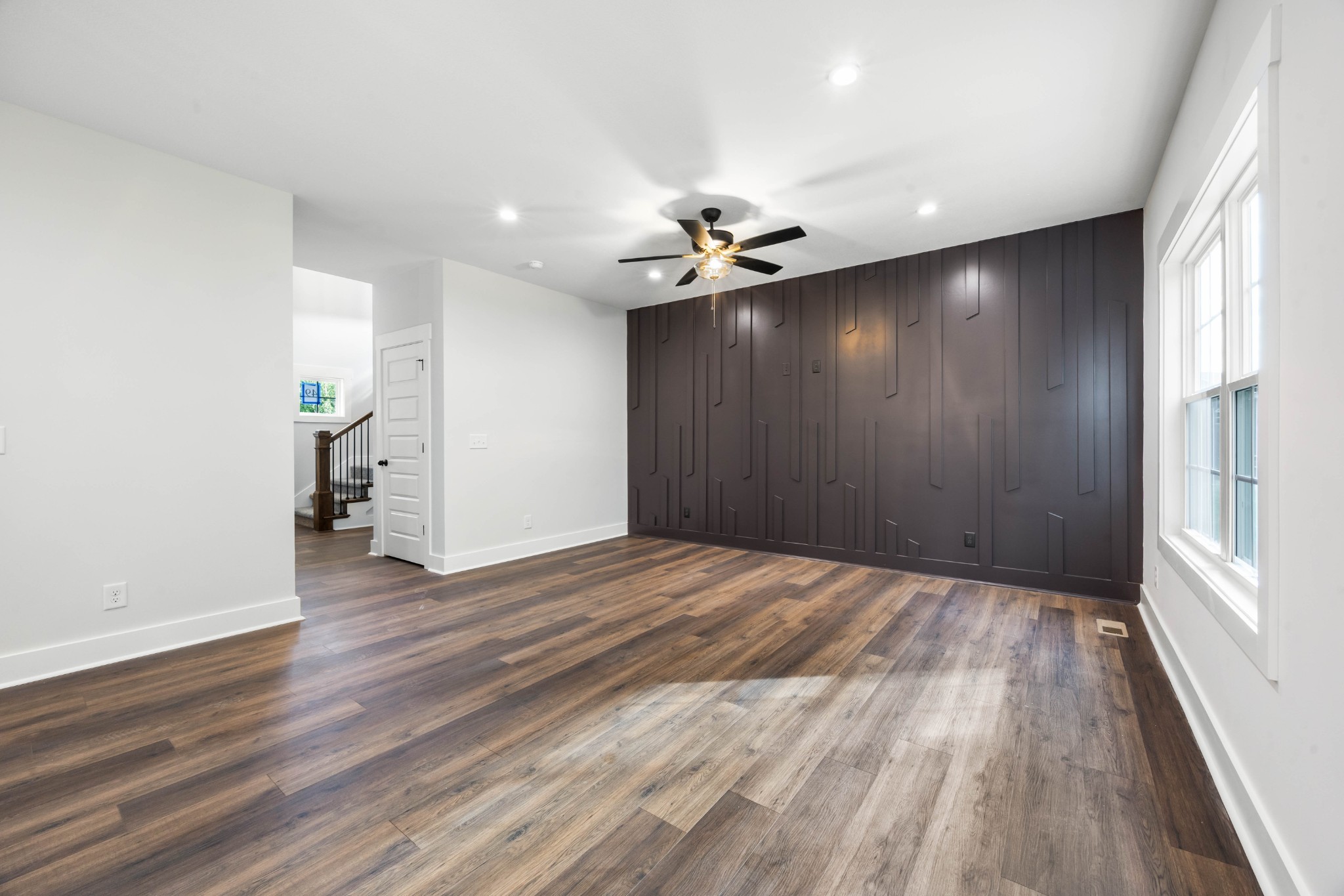 1146 Black Rock Road Clarksville, TN 37040 - Photo 8 of 36 wooden floor in an empty room with a window