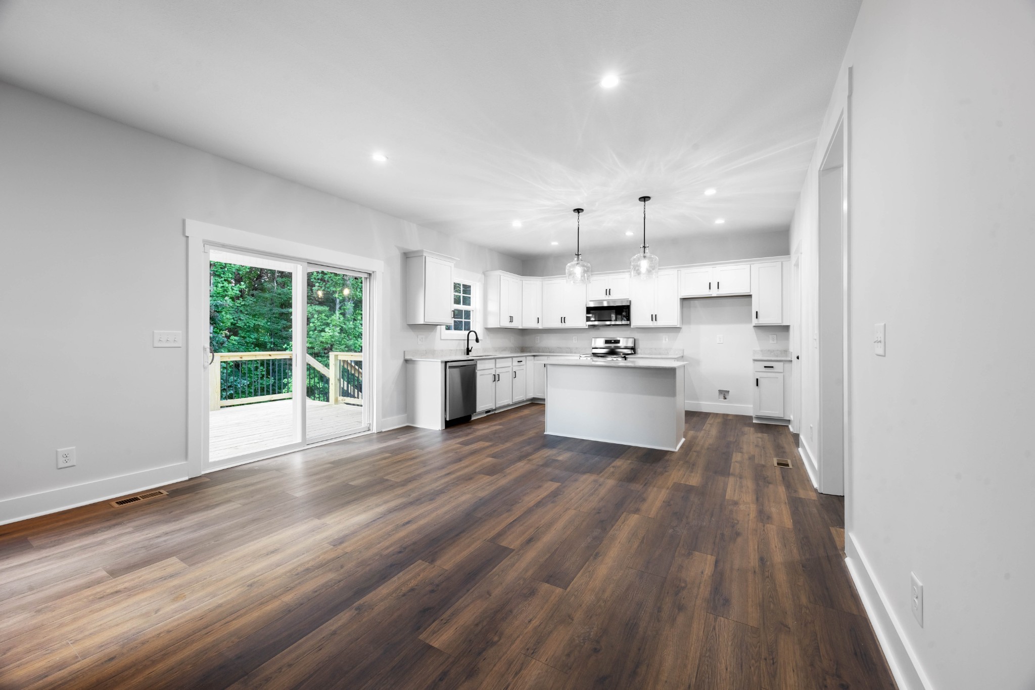 1146 Black Rock Road Clarksville, TN 37040 - Photo 10 of 36 a view of kitchen with wooden floor and electronic appliances