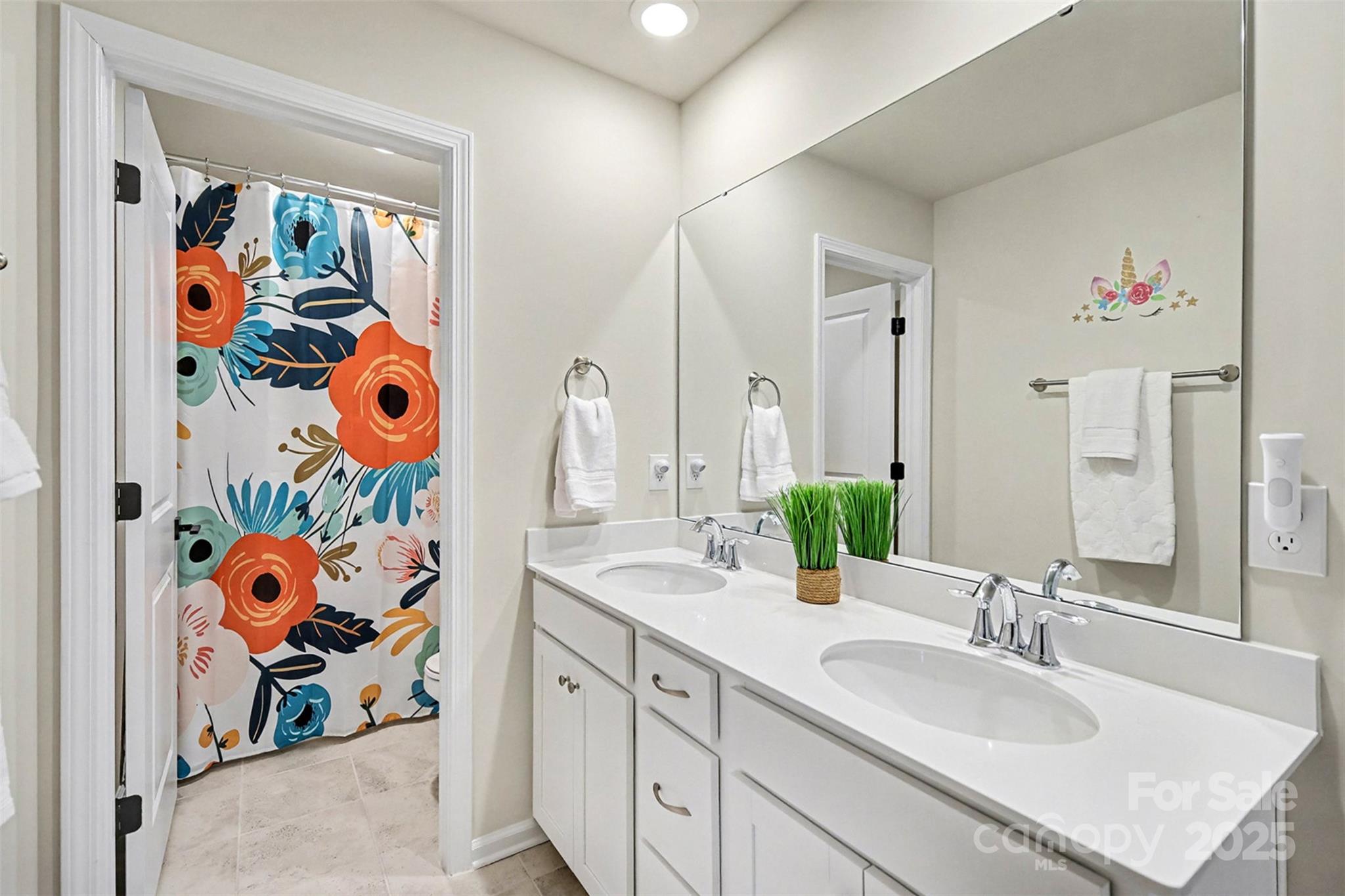 152 Tackle Troutman, NC 28166 - Photo 16 of 31 a bathroom with a sink mirror and view of painting