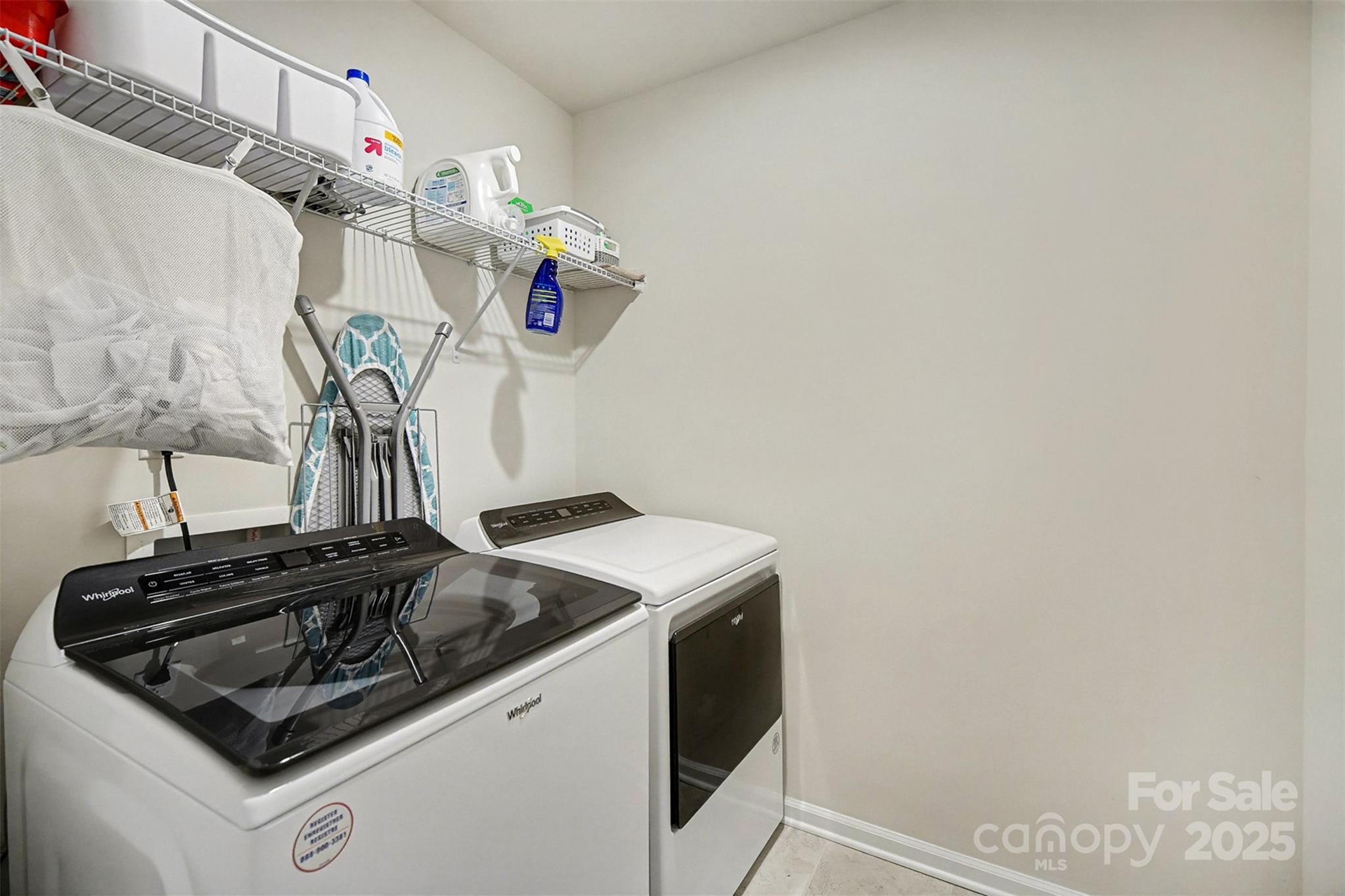 152 Tackle Troutman, NC 28166 - Photo 18 of 31 a utility room with dryer and washer