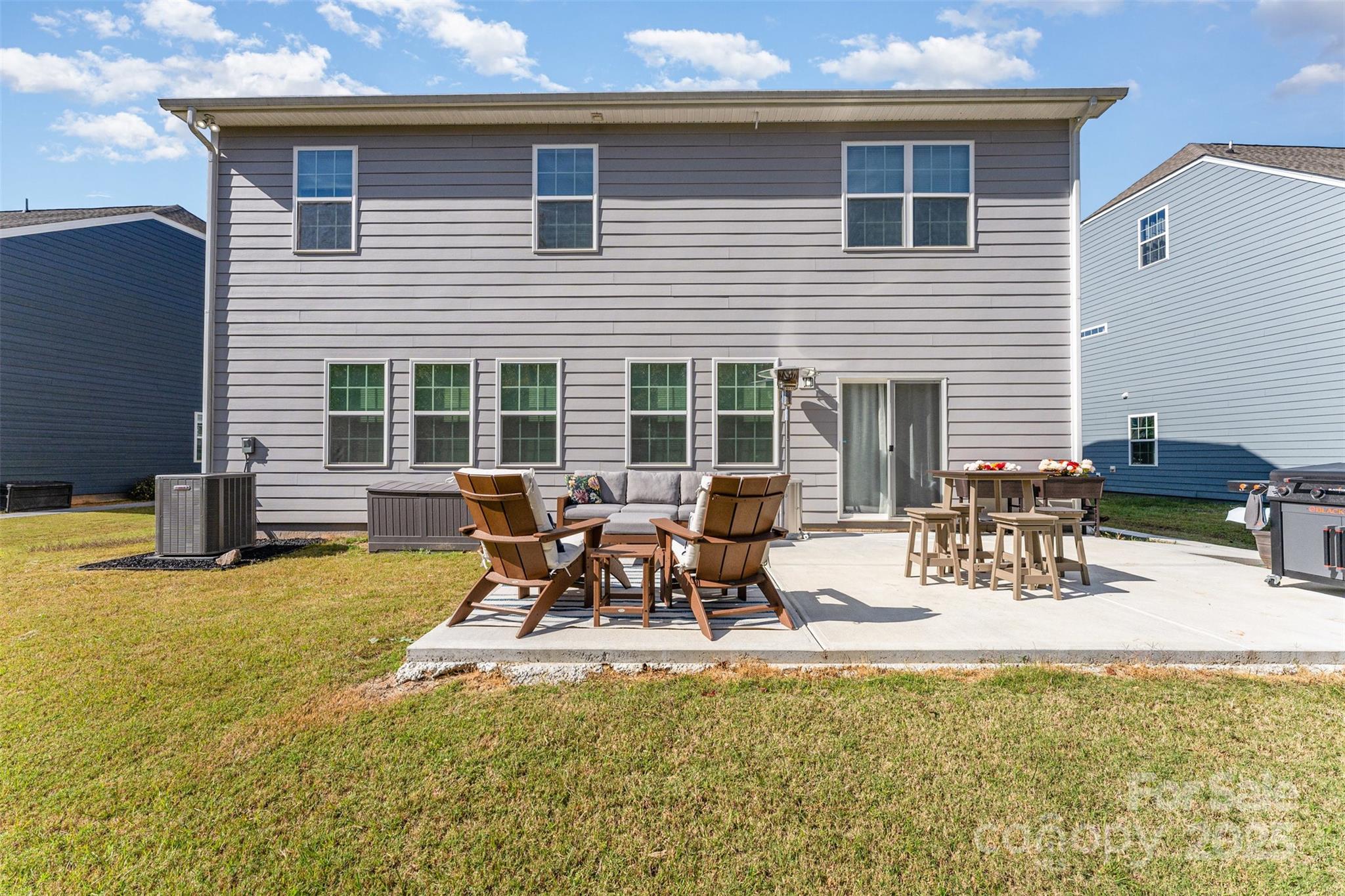 152 Tackle Troutman, NC 28166 - Photo 25 of 31 a view of a house with swimming pool and sitting area