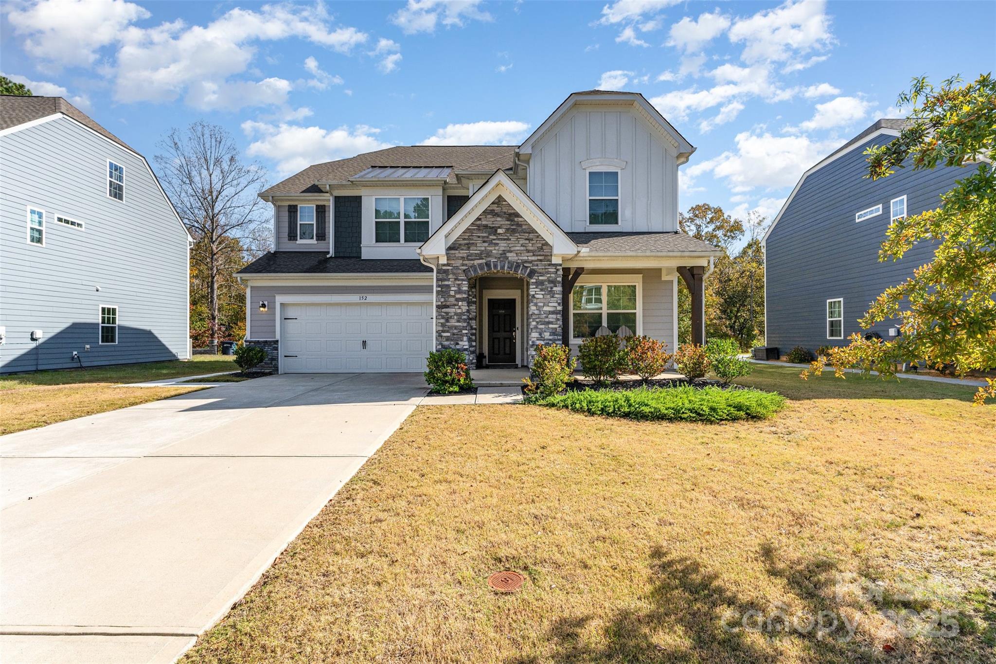 152 Tackle Troutman, NC 28166 - Photo 27 of 31 a front view of a house with a yard