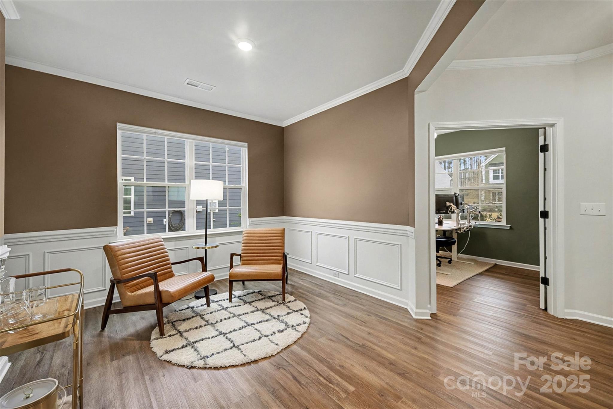 152 Tackle Troutman, NC 28166 - Photo 9 of 31 a living room with furniture and a wooden floor