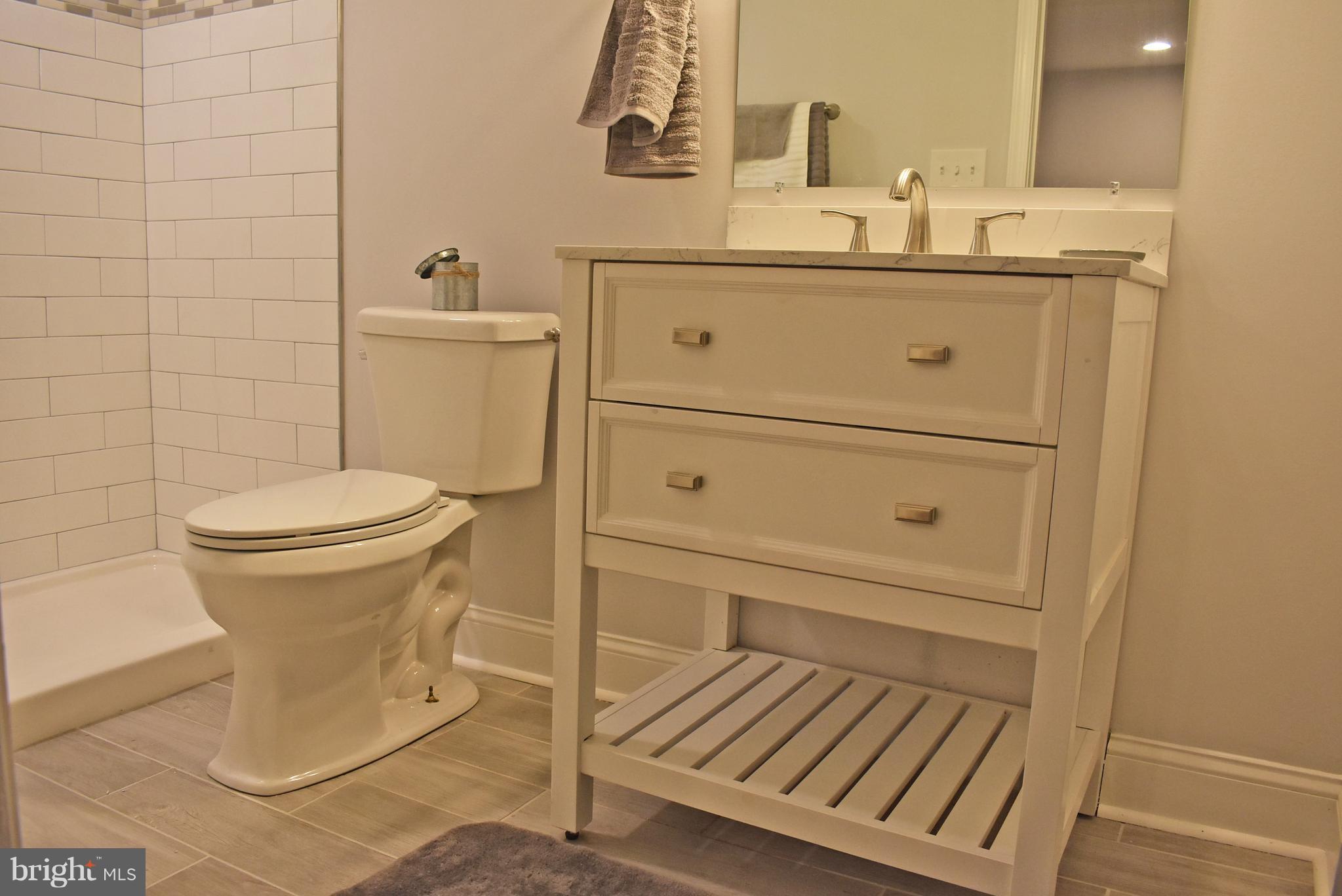7809 Harold Road Baltimore, MD 21222 - Photo 19 of 36 a bathroom with a sink and a toilet