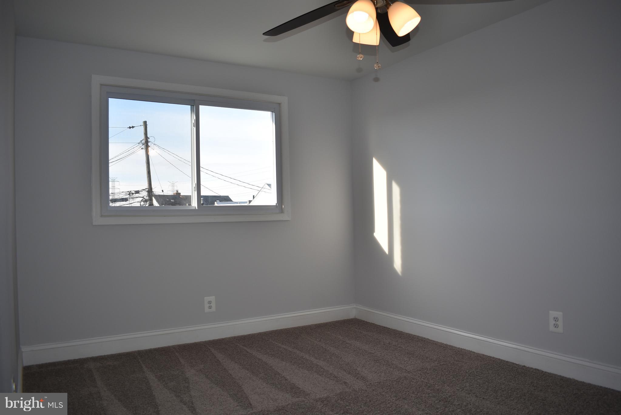 7809 Harold Road Baltimore, MD 21222 - Photo 24 of 36 an empty room that has a window