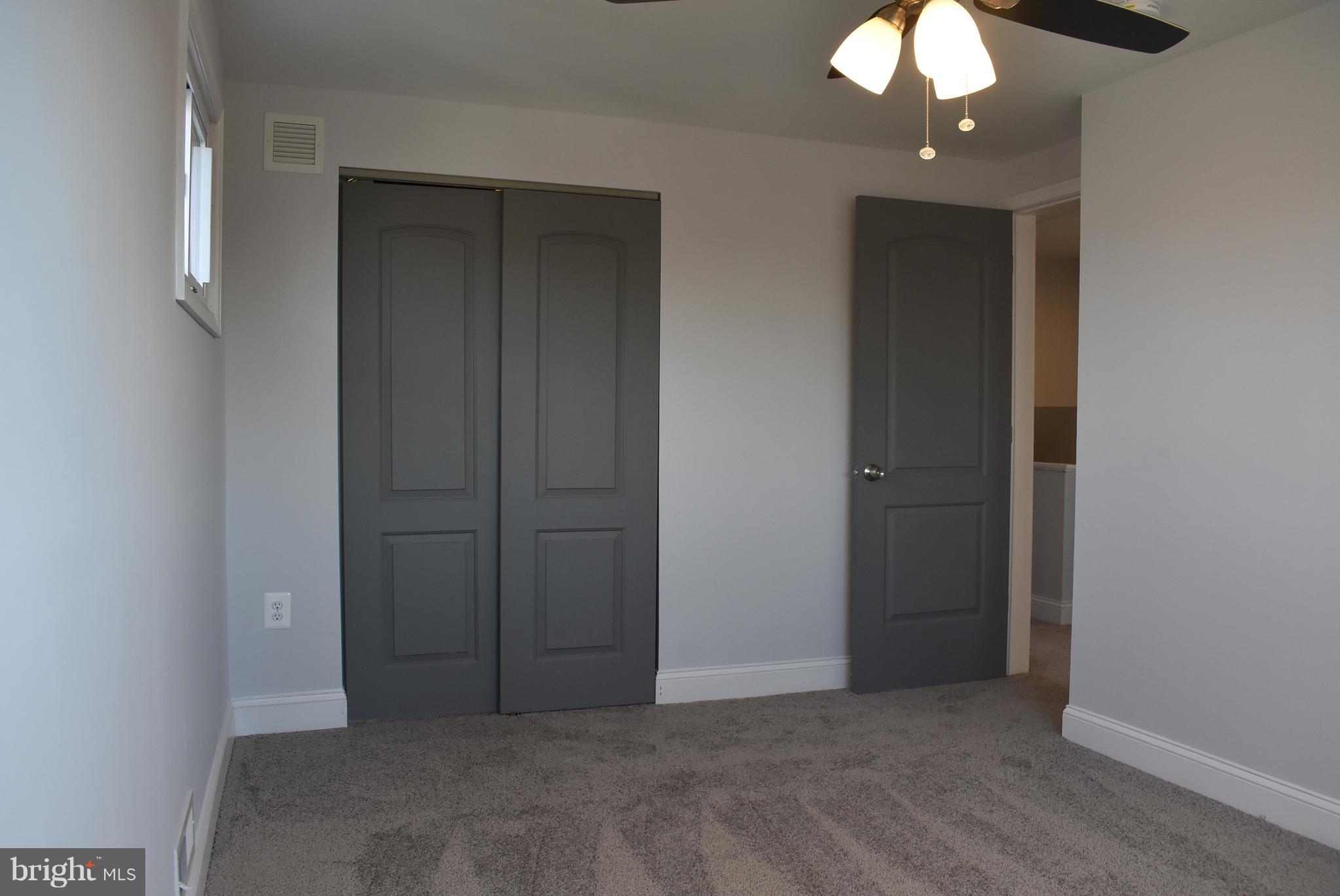 7809 Harold Road Baltimore, MD 21222 - Photo 25 of 36 an empty room with closet area