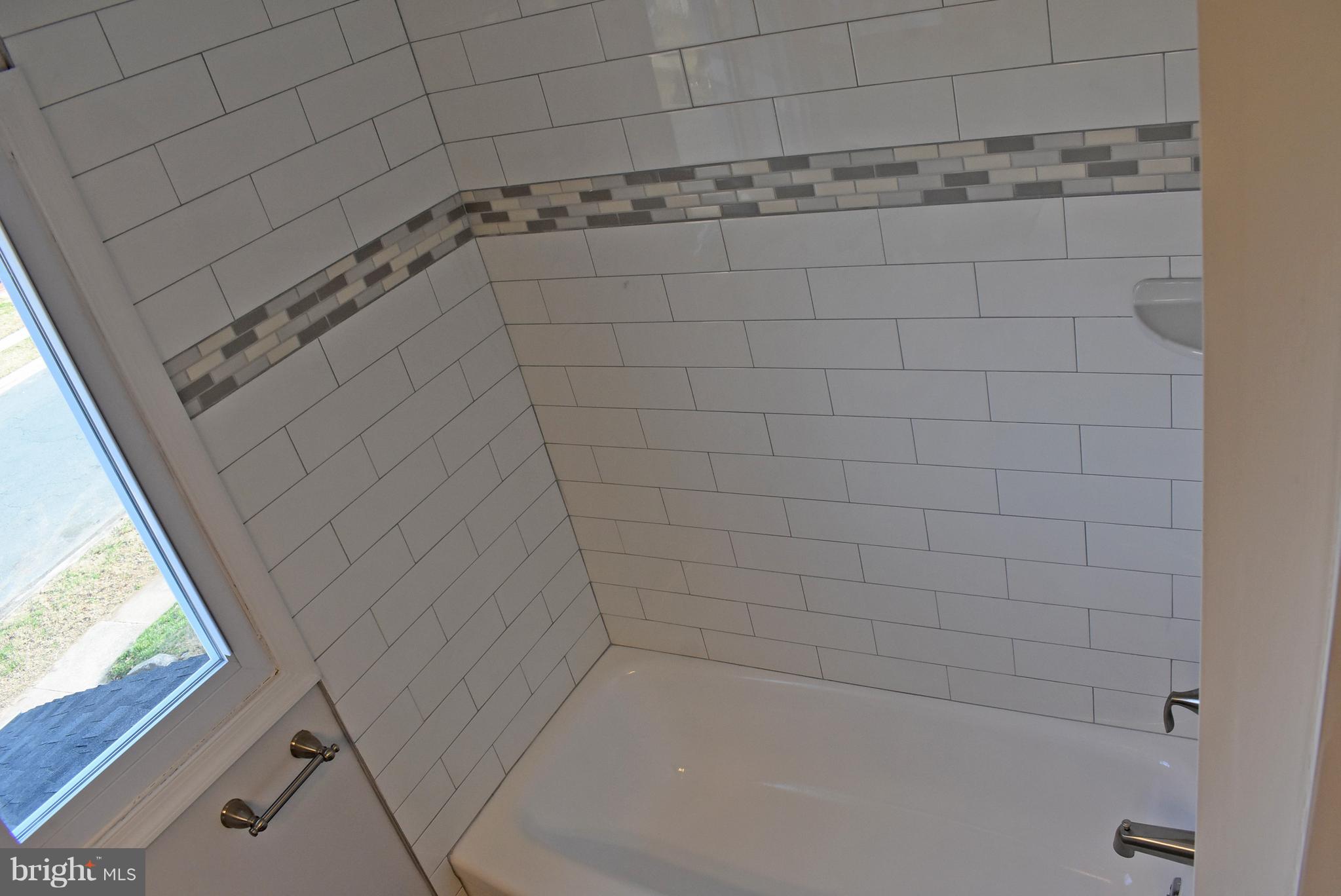 7809 Harold Road Baltimore, MD 21222 - Photo 30 of 36 a bathroom with a bathtub