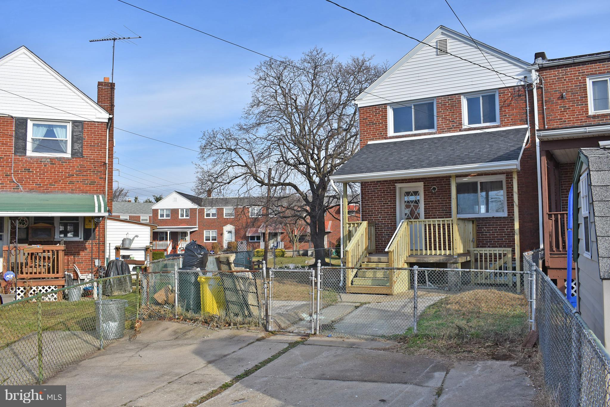 7809 Harold Road Baltimore, MD 21222 - Photo 36 of 36 a front view of a house with a tree