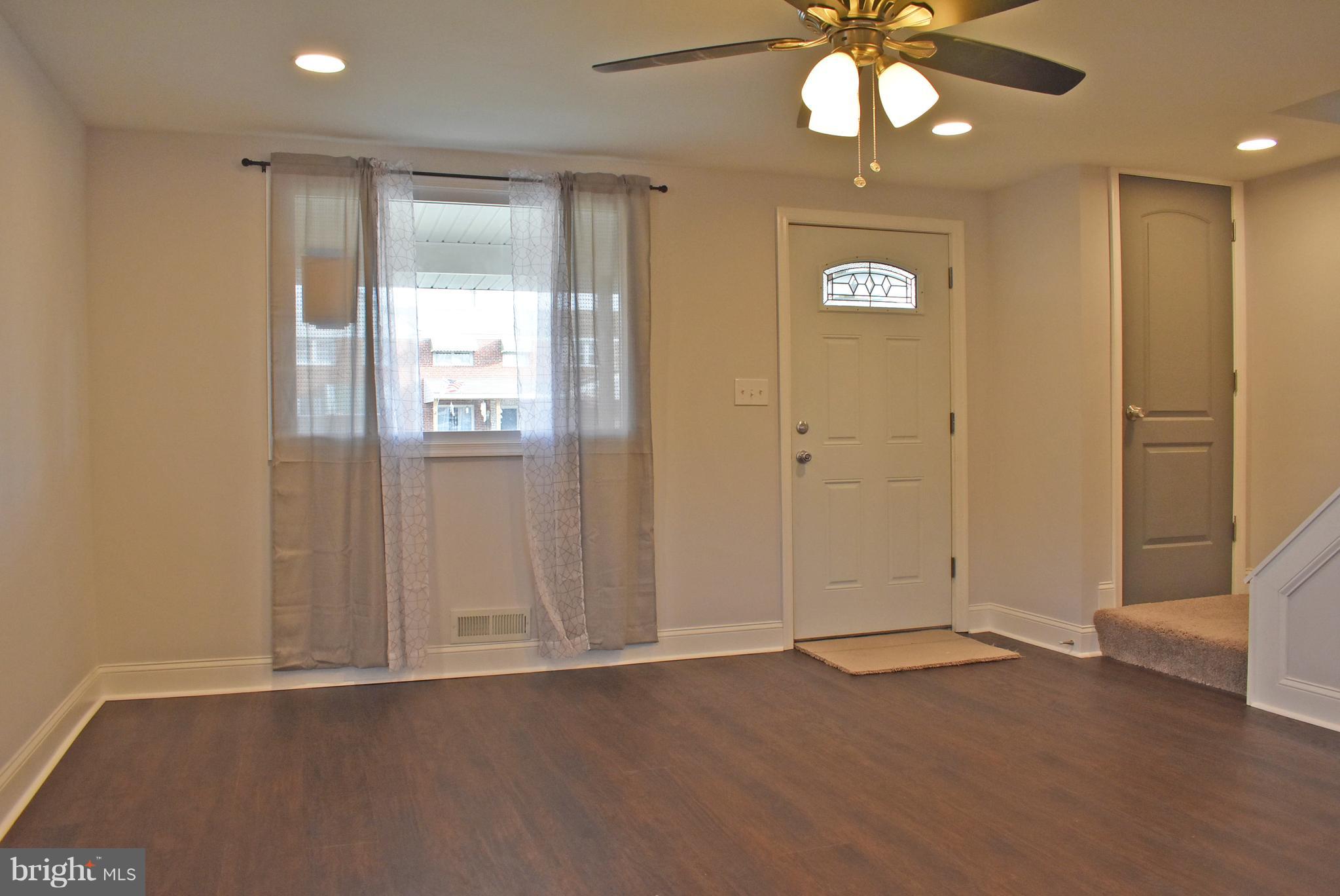 7809 Harold Road Baltimore, MD 21222 - Photo 8 of 36 an empty room with windows and closet