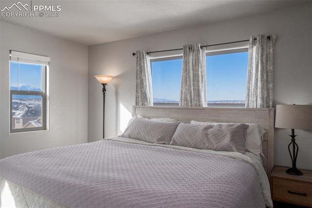 8302 Watchmen Road Fountain, CO 80817 - Photo 16 of 34 Primary bedroom with Pikes Peak Views