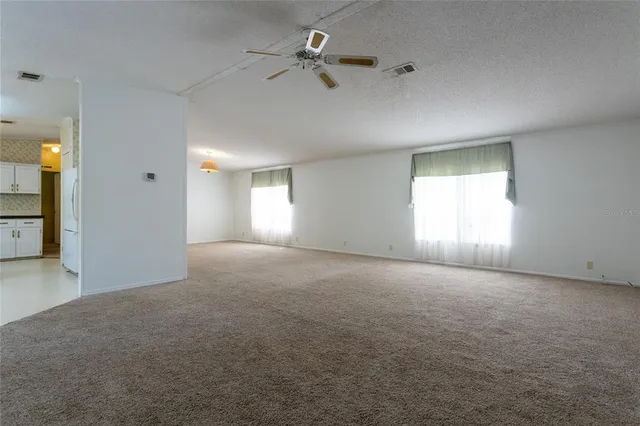 a wooden bench sitting on top of a wooden deck