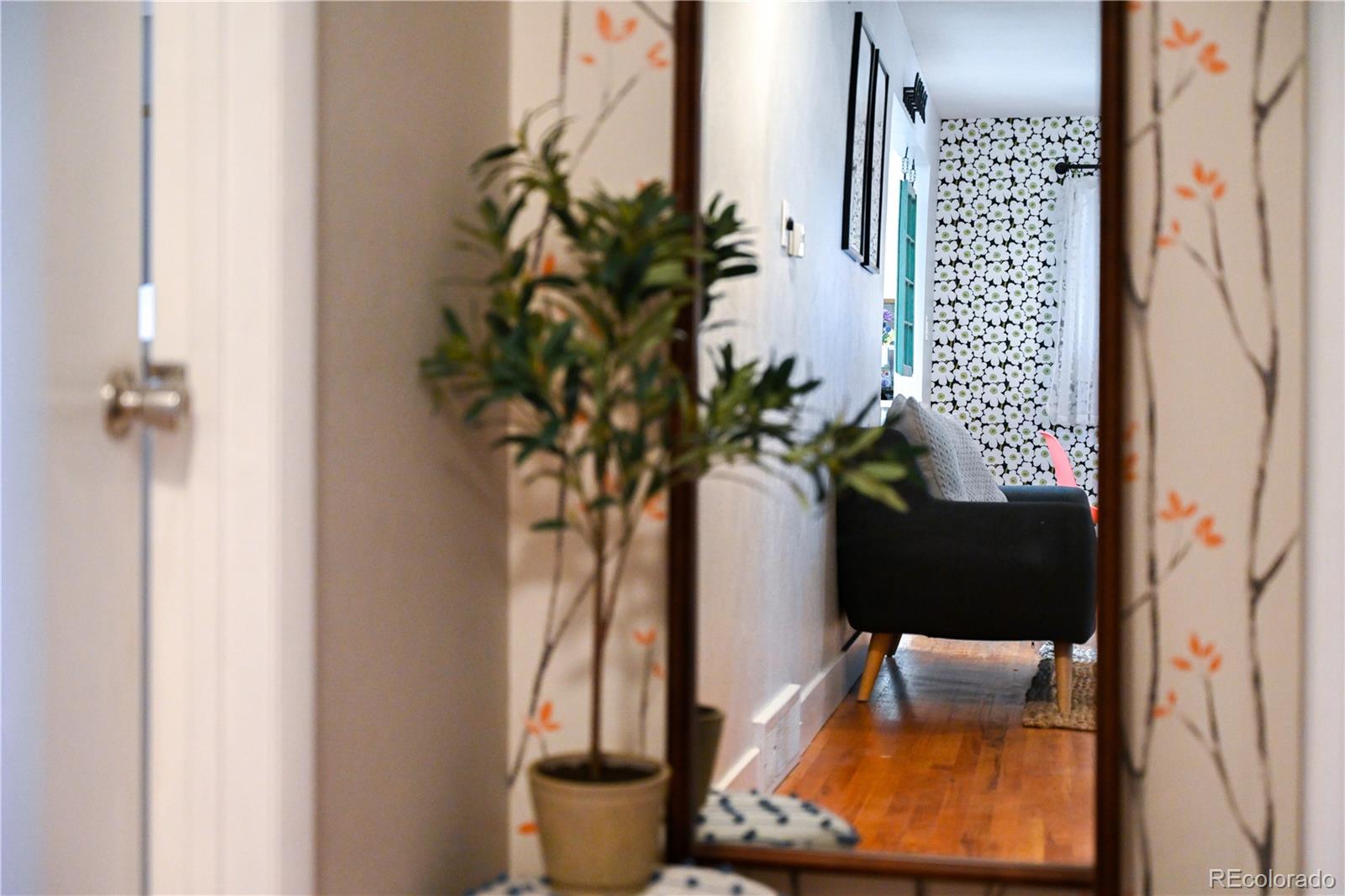 7051 Ruth Way Denver, CO 80221 - Photo 36 of 36 a vase of flowers sitting on a table