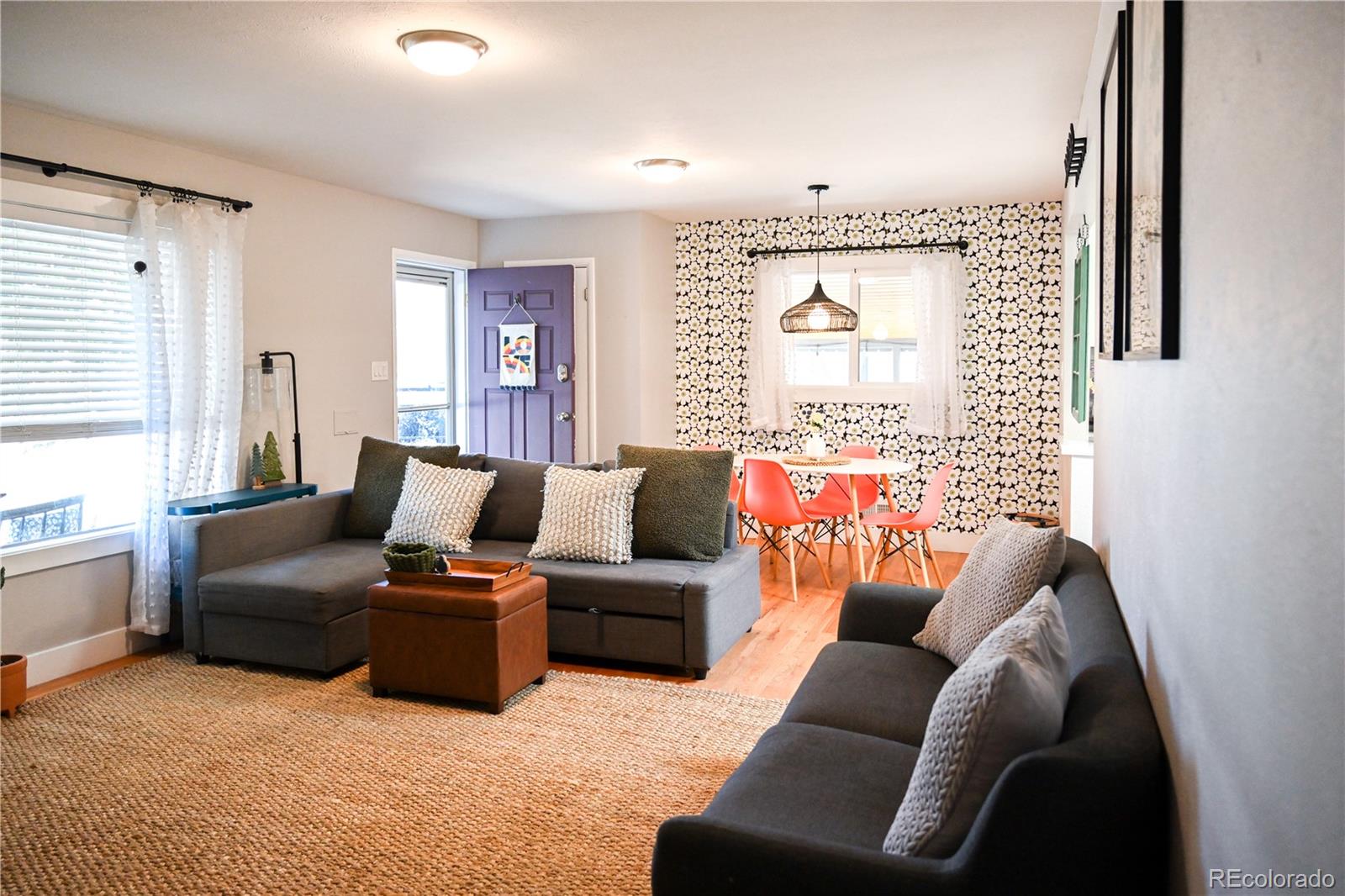 7051 Ruth Way Denver, CO 80221 - Photo 5 of 36 a living room with furniture and a large window