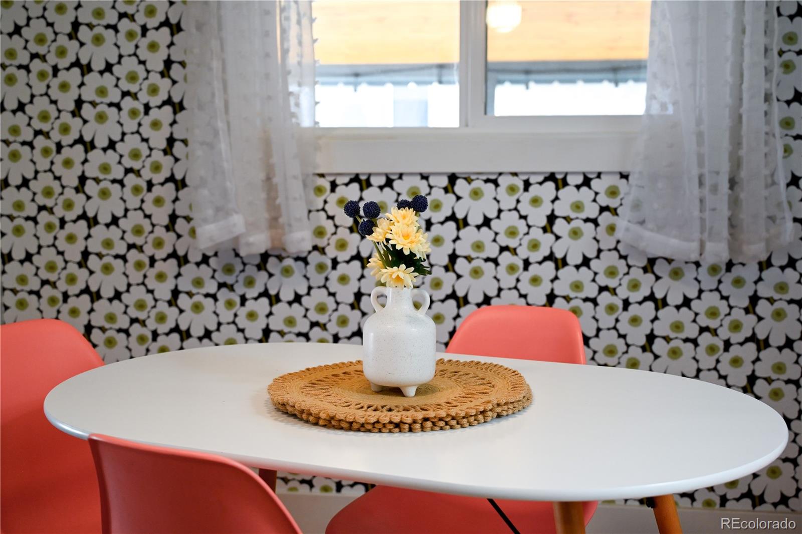 7051 Ruth Way Denver, CO 80221 - Photo 8 of 36 a view of a dining room with furniture and window