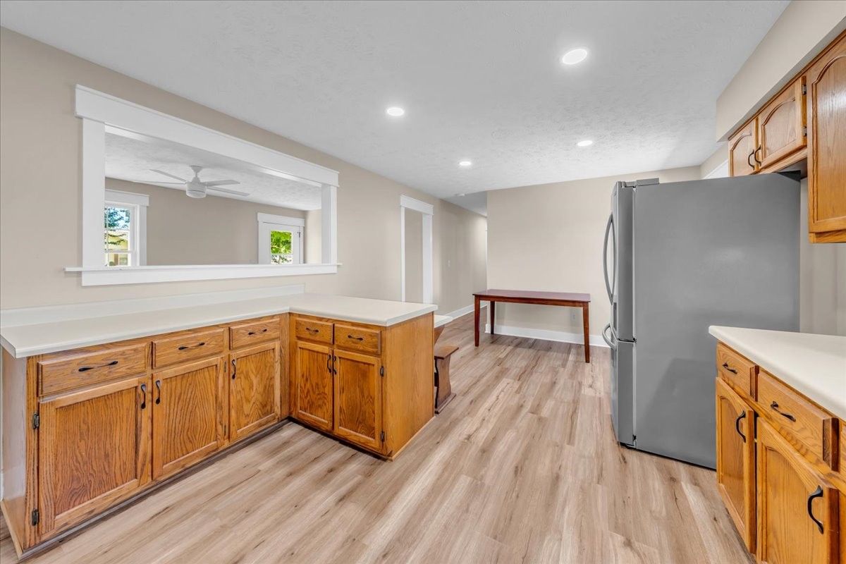 145 Hawkins Road Smithville, TN 37166 - Photo 14 of 45 a view of a kitchen with wooden floor and a sink