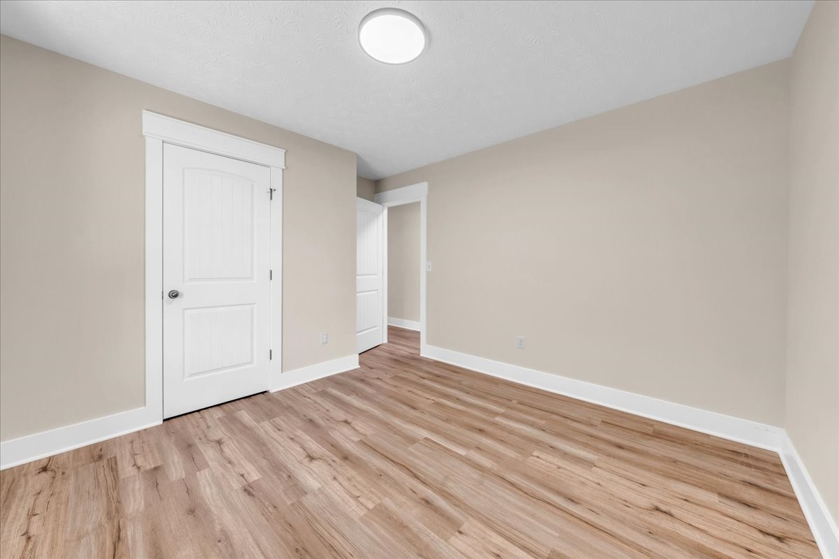 145 Hawkins Road Smithville, TN 37166 - Photo 23 of 45 a view of an empty room and wooden floor