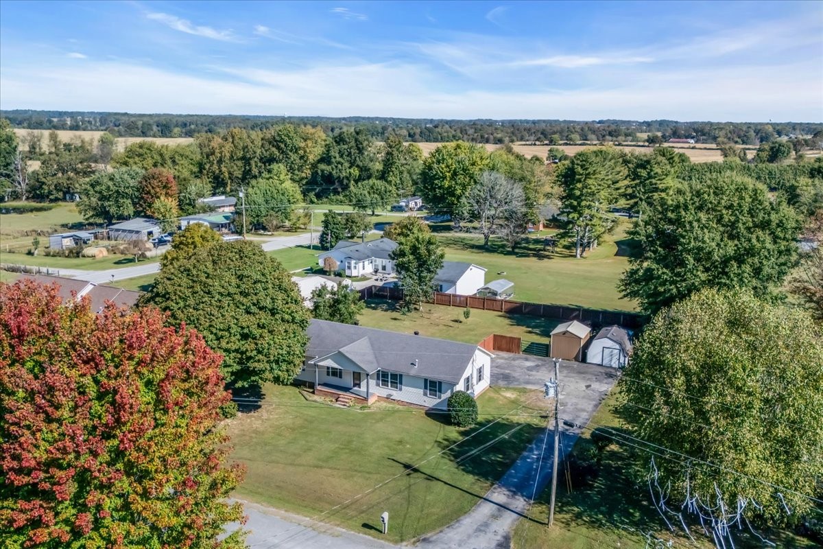 145 Hawkins Road Smithville, TN 37166 - Photo 36 of 45 an aerial view of a city with lots of residential buildings ocean and mountain view in back