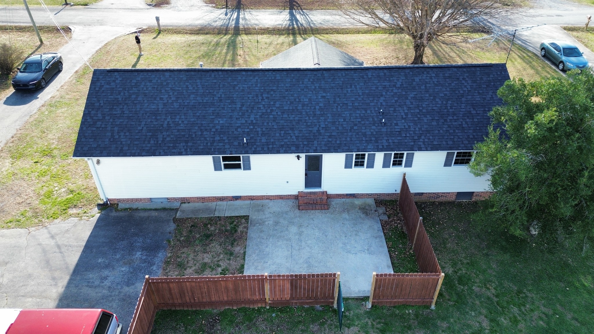 145 Hawkins Road Smithville, TN 37166 - Photo 41 of 45 a view of a back yard with a table and chair under an umbrella