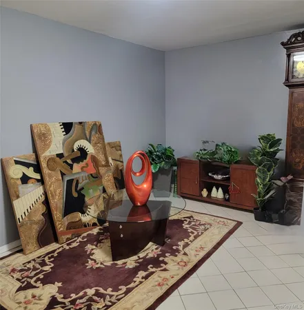 a bed room with a bed and a night stand