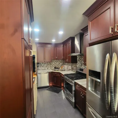 a kitchen with a stove and a sink