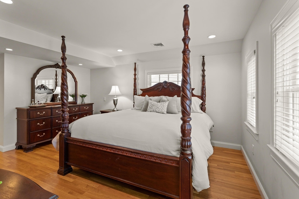 26 Stowell Road Winchester, MA 01890 - Photo 24 of 42 a bedroom with bed and wooden floor