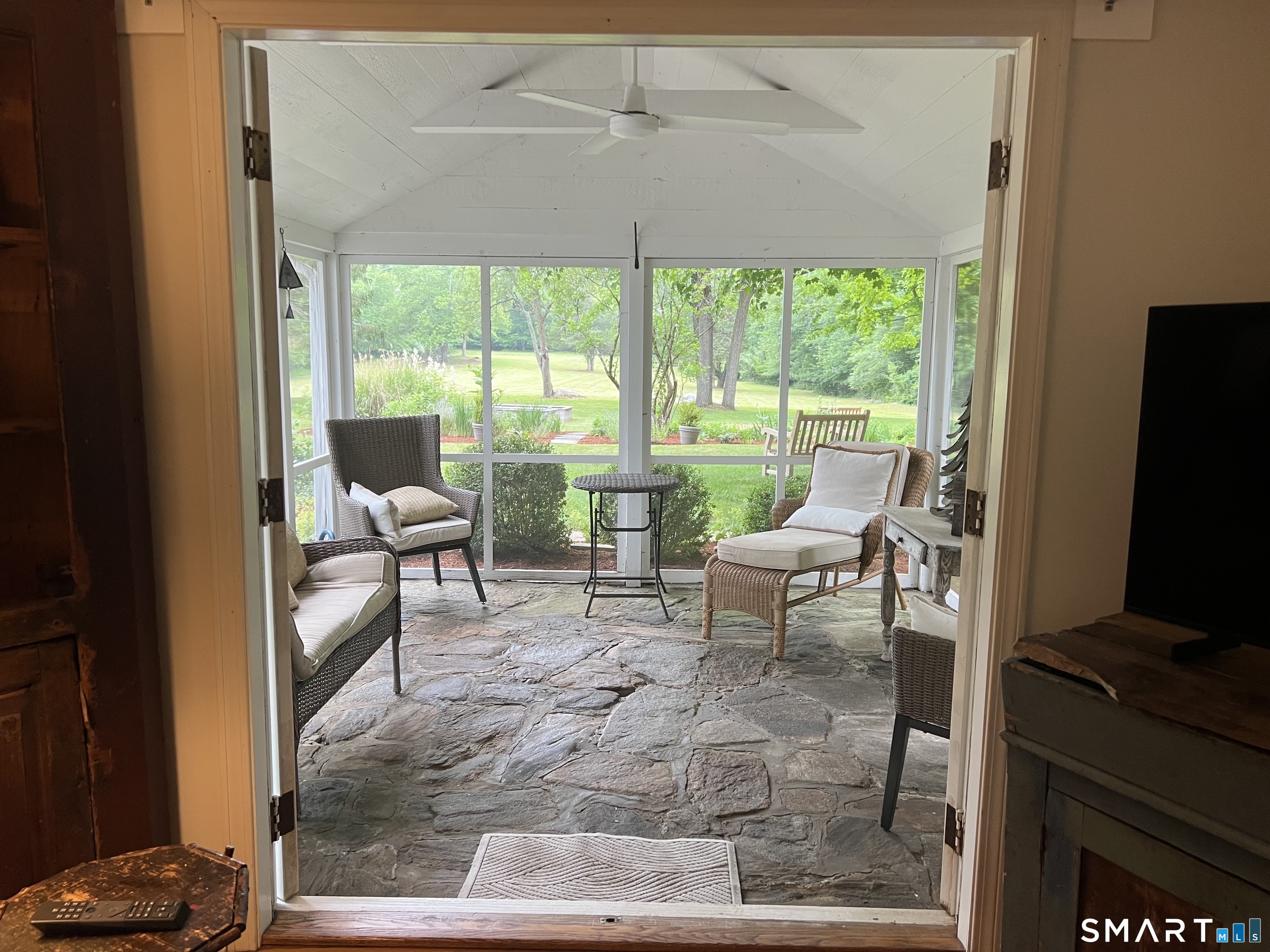 2415 Durham Road Madison, CT 06443 - Photo 15 of 37 From Living Room looking into Porch