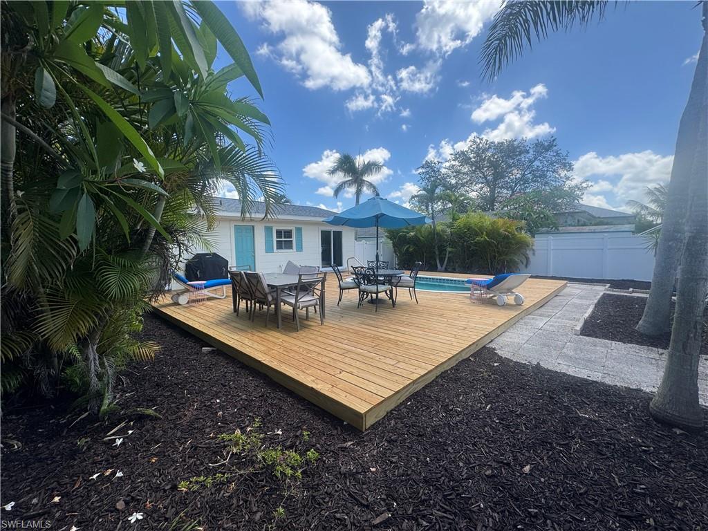 1012 Ridge Street Naples, FL 34103 - Photo 19 of 19 a view of a house with backyard and sitting area