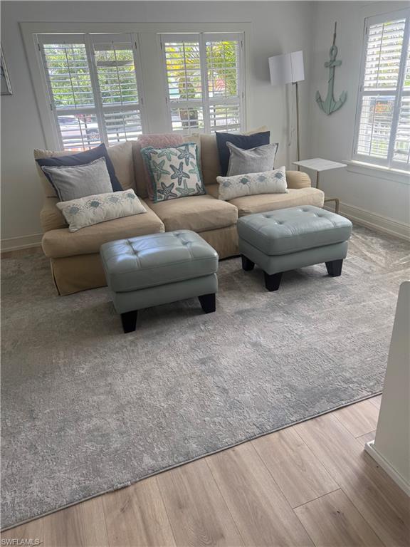 1012 Ridge Street Naples, FL 34103 - Photo 3 of 19 a living room with furniture and a large window