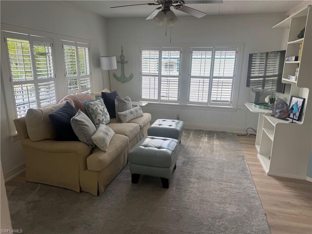 1012 Ridge Street Naples, FL 34103 - Photo 5 of 19 a living room with furniture and a large window