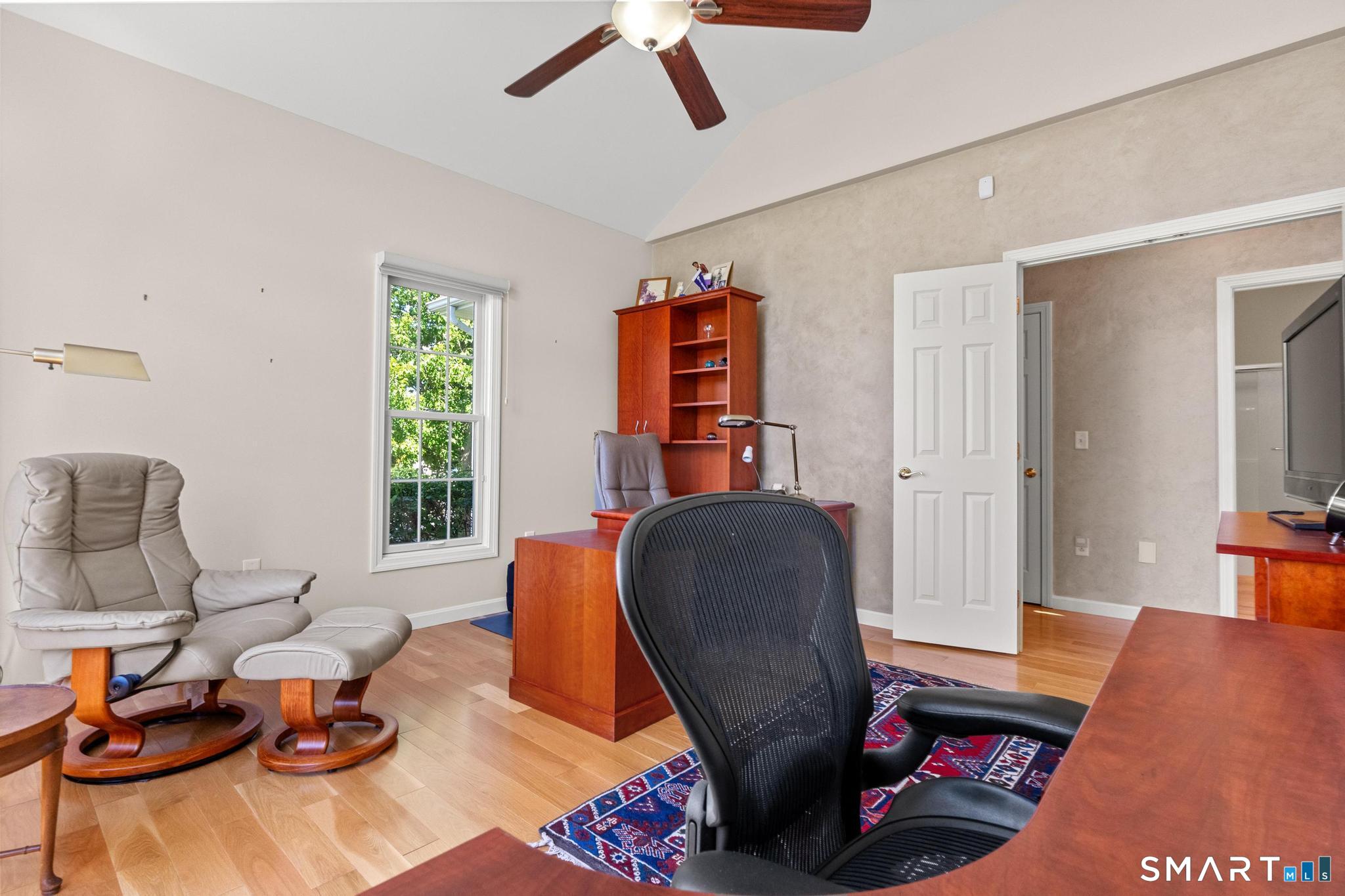 31 Gooseberry Road Suffield, CT 06078 - Photo 24 of 33 a living room with furniture and a wooden floor