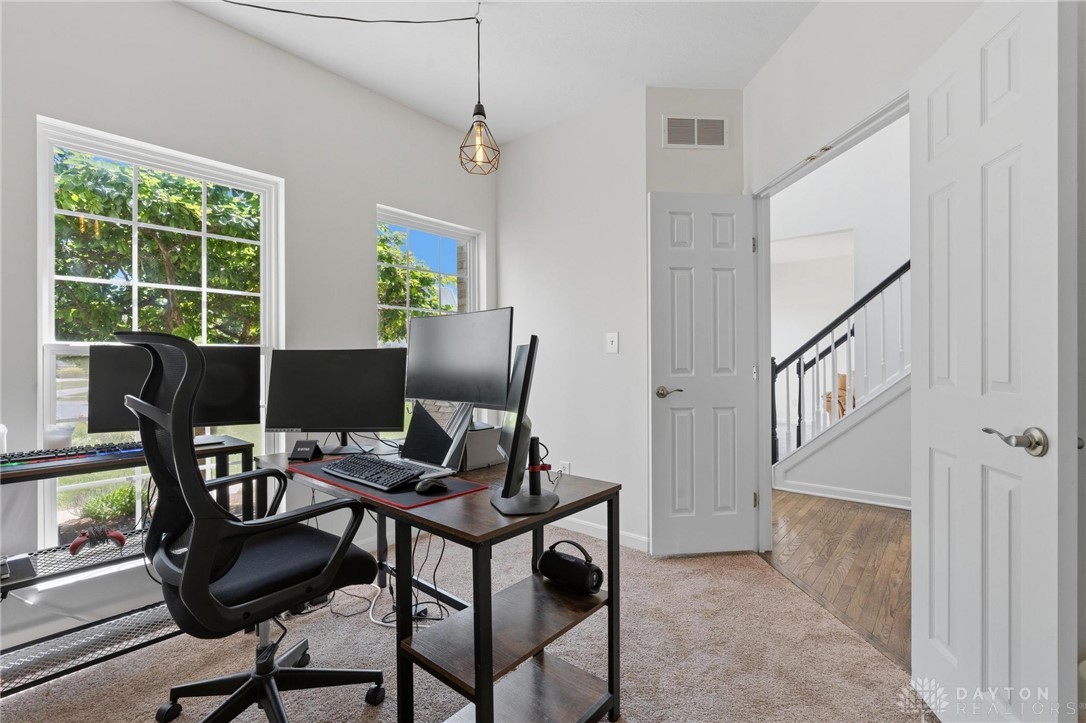 70 Martin Lane Springboro, OH 45066 - Photo 26 of 69 This bright office space offers abundant natural light and a seamless connection to the rest of the home.