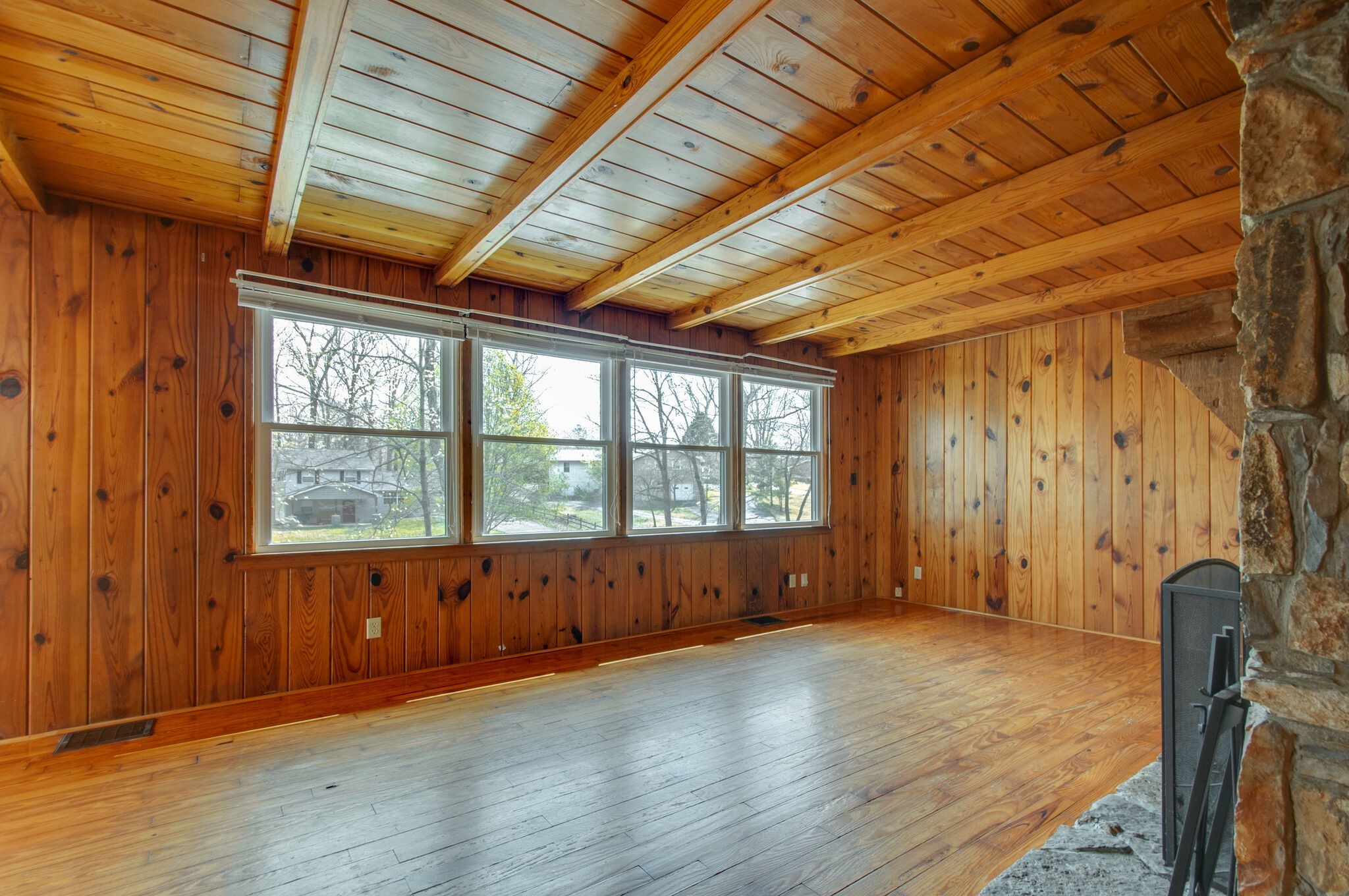 209 East Park Circle Dickson, TN 37055 - Photo 12 of 28 an empty room with wooden floor and windows