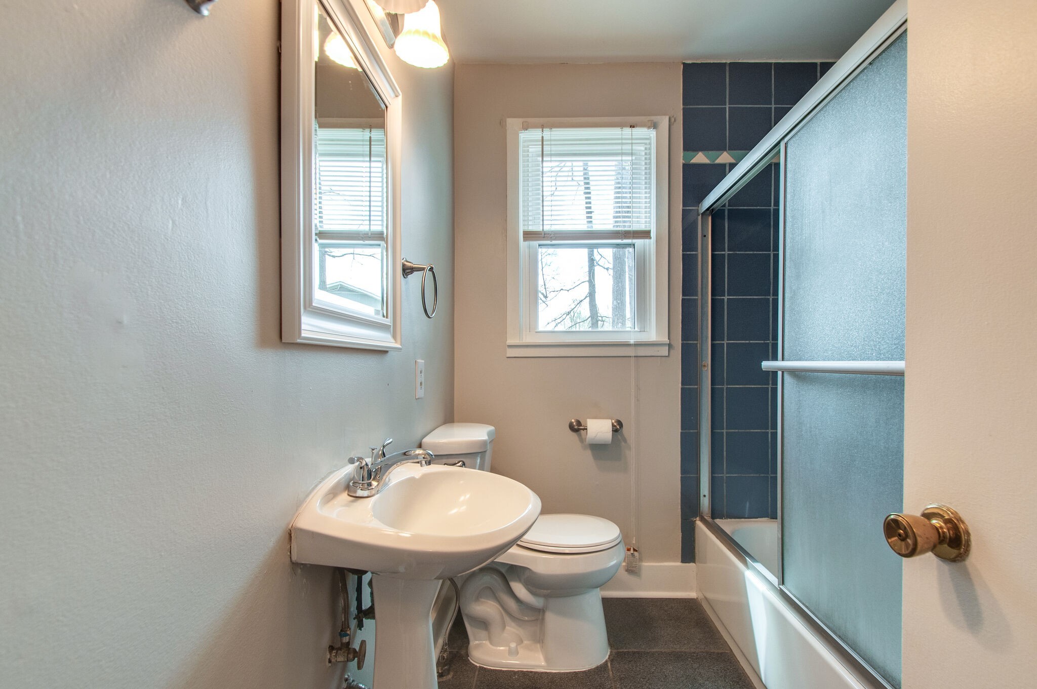 209 East Park Circle Dickson, TN 37055 - Photo 18 of 28 a bathroom with a sink toilet and shower