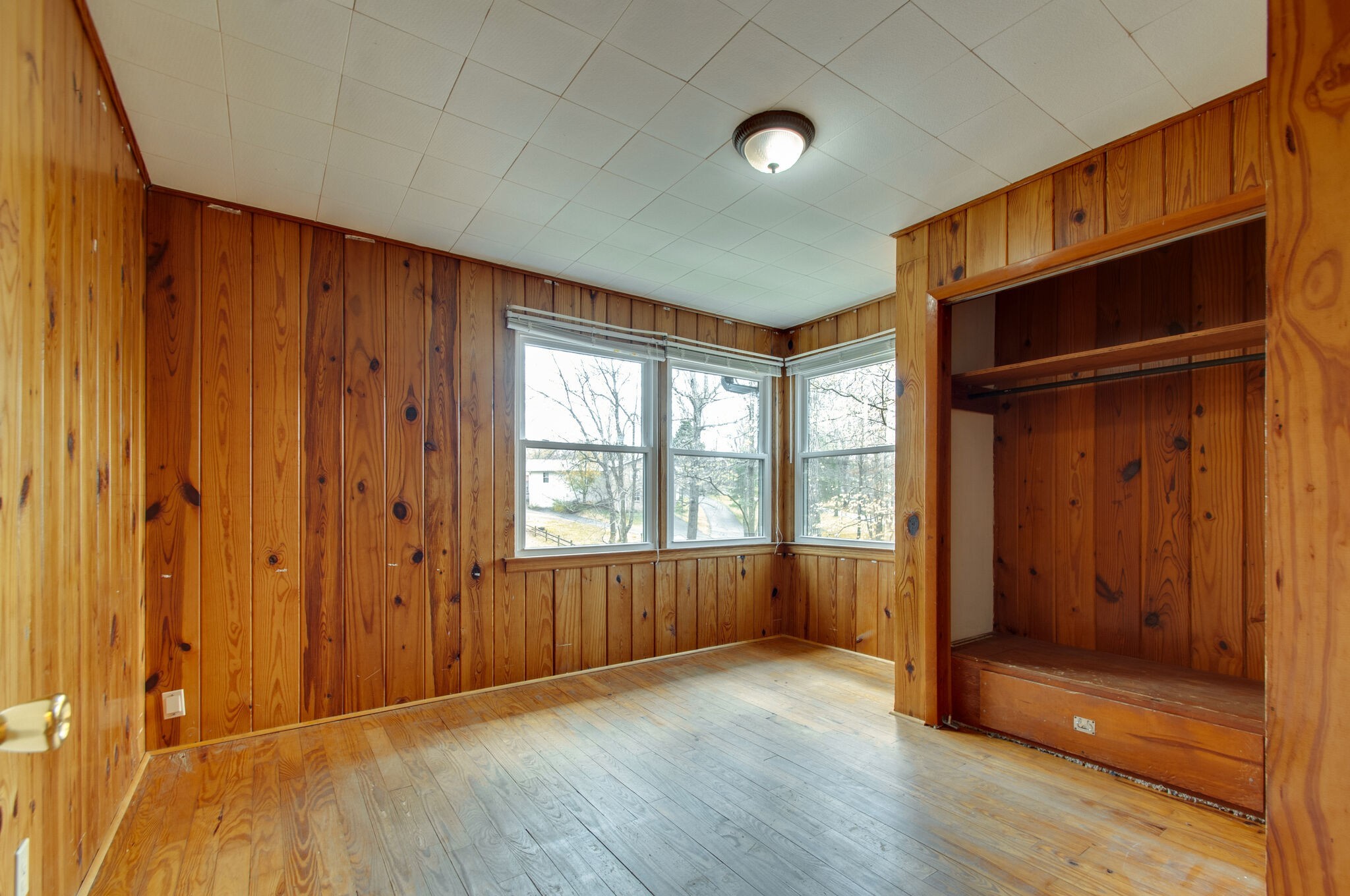 209 East Park Circle Dickson, TN 37055 - Photo 19 of 28 an empty room with wooden floor and windows