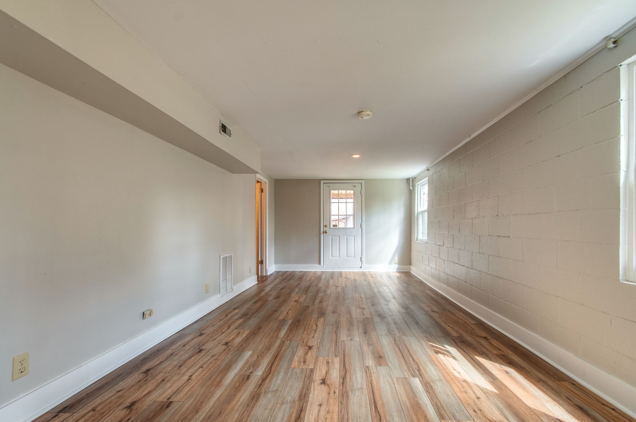 209 East Park Circle Dickson, TN 37055 - Photo 21 of 28 a view of wooden floor and windows in a room