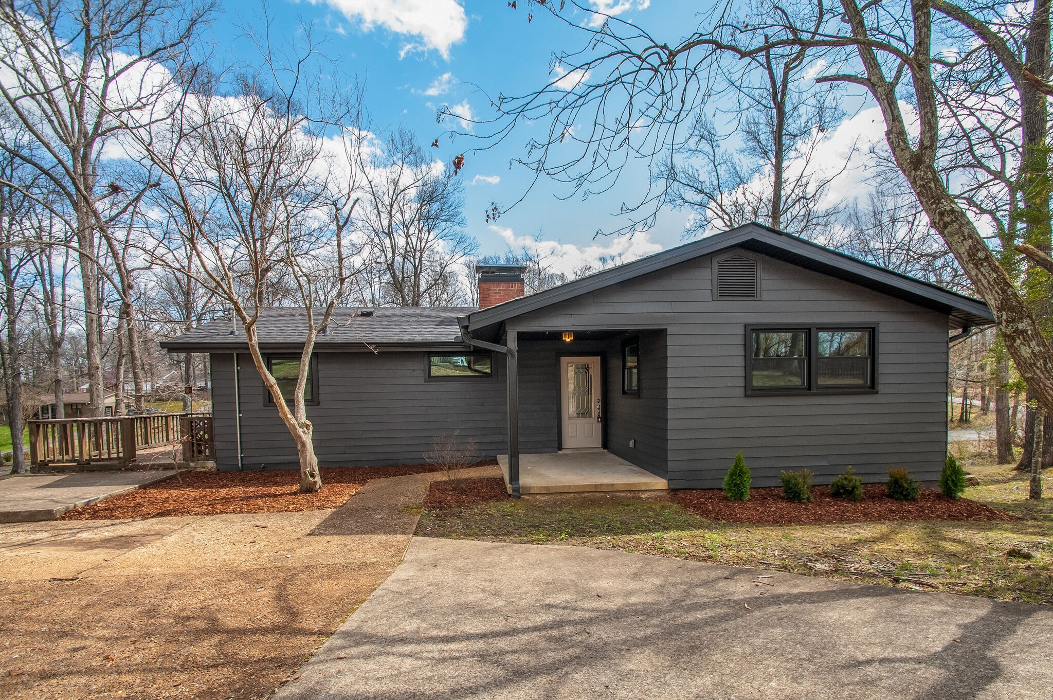 209 East Park Circle Dickson, TN 37055 - Photo 4 of 28 a front view of a house with garage