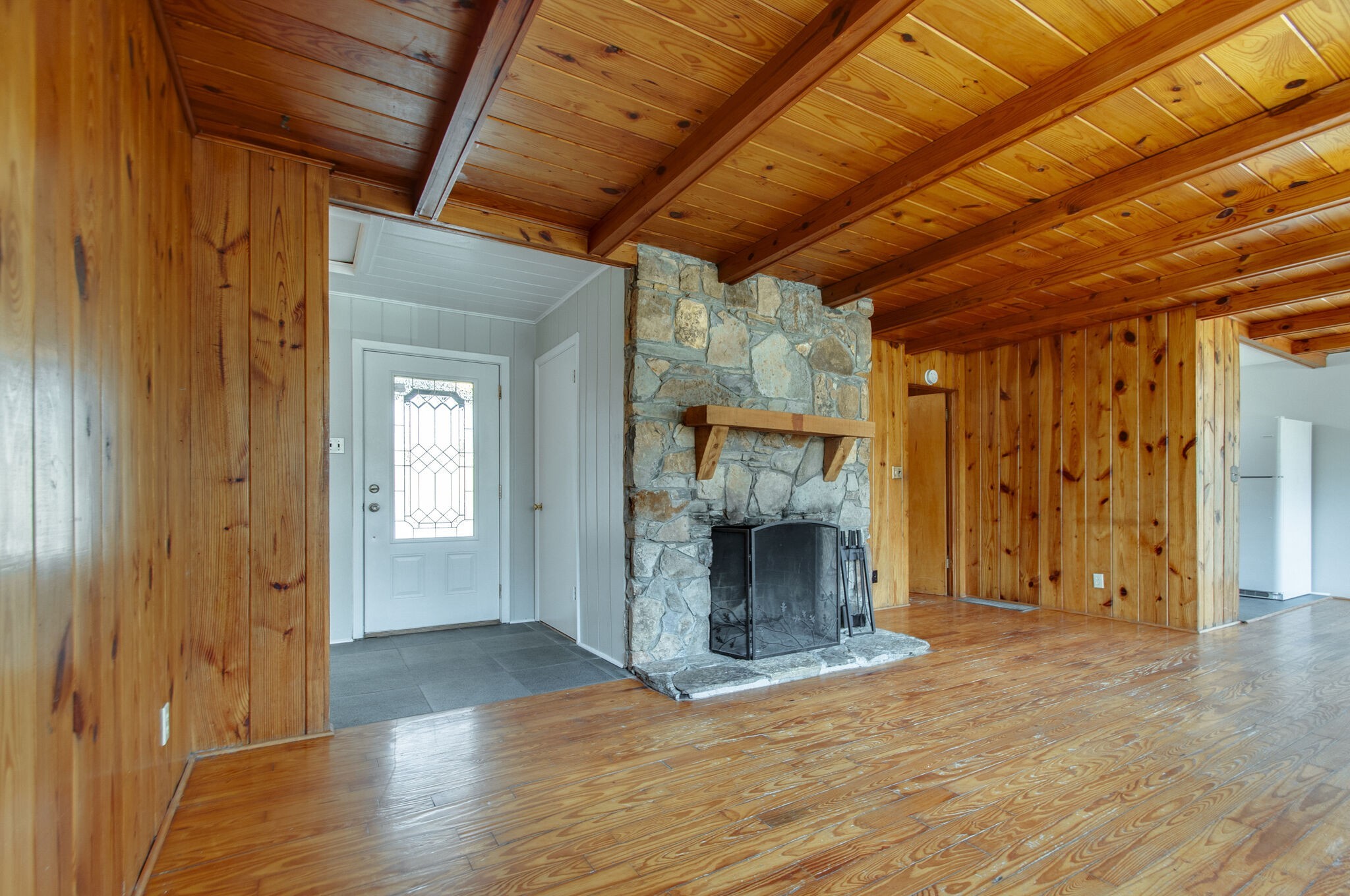 209 East Park Circle Dickson, TN 37055 - Photo 8 of 28 a view of empty room with wooden floor and fireplace