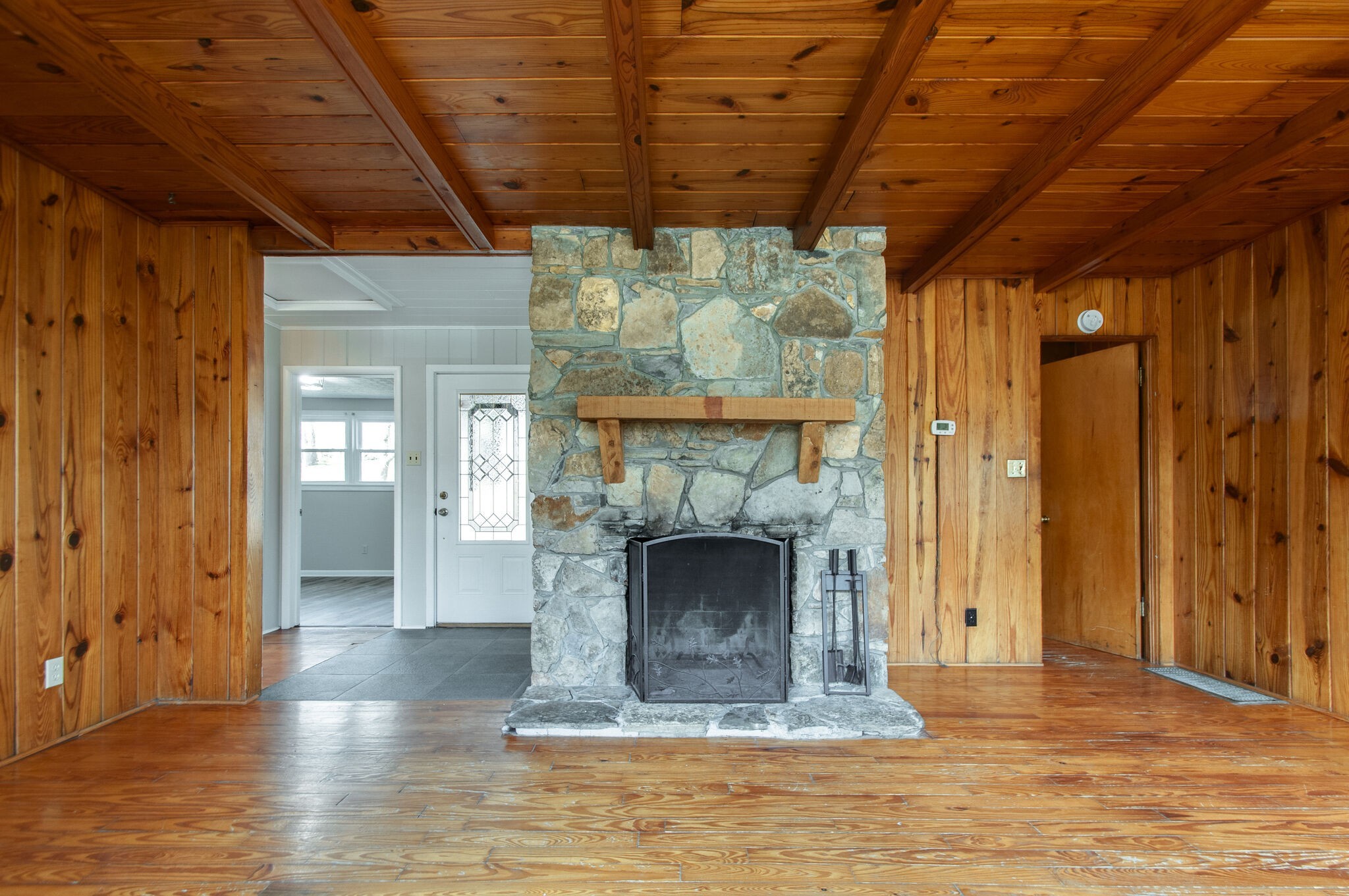 209 East Park Circle Dickson, TN 37055 - Photo 9 of 28 a view of an empty room with a fireplace and a window