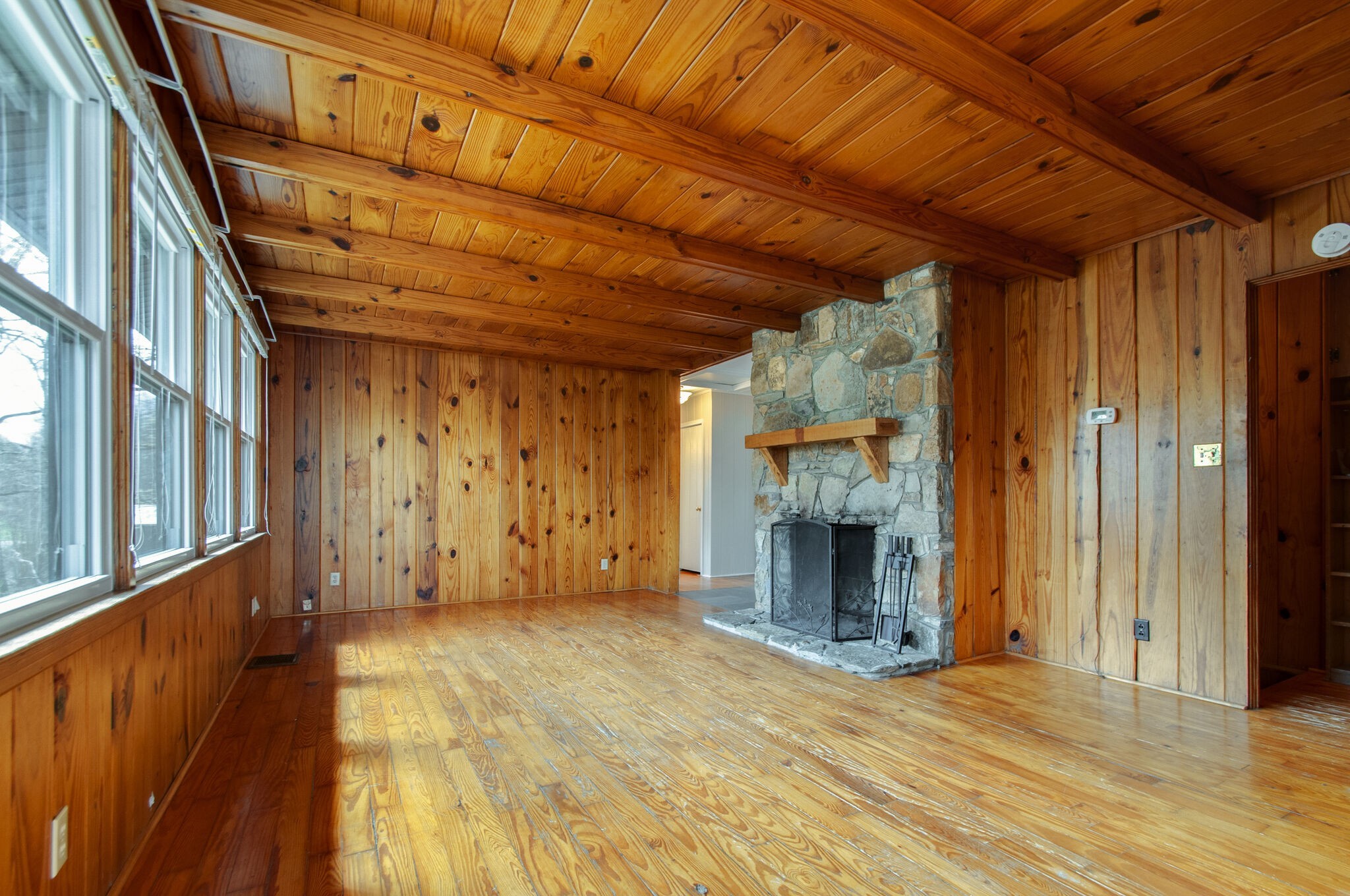 209 East Park Circle Dickson, TN 37055 - Photo 10 of 28 a view of an empty room with wooden floor and a window